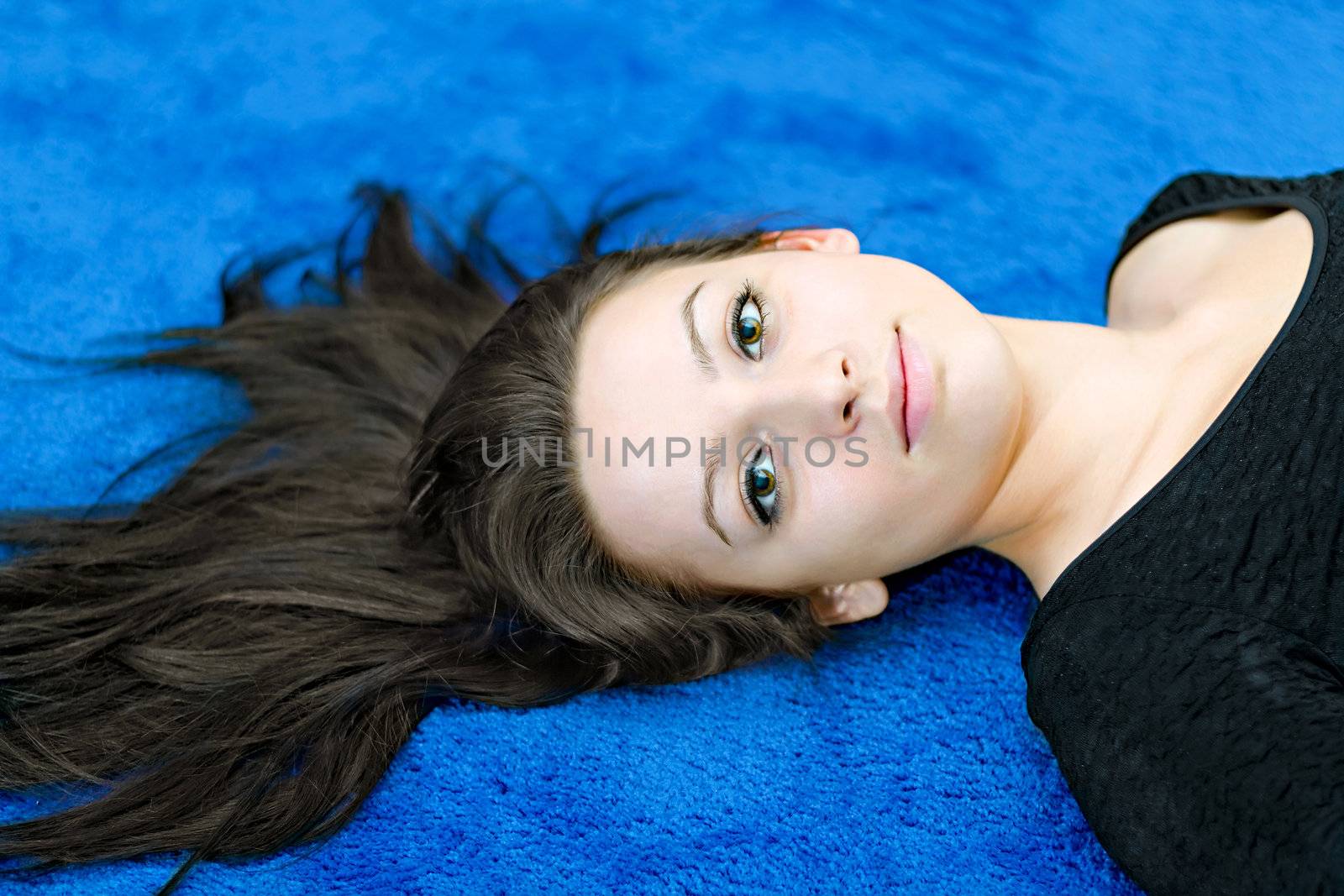 portrait of a young girl on a blue background by Plus69