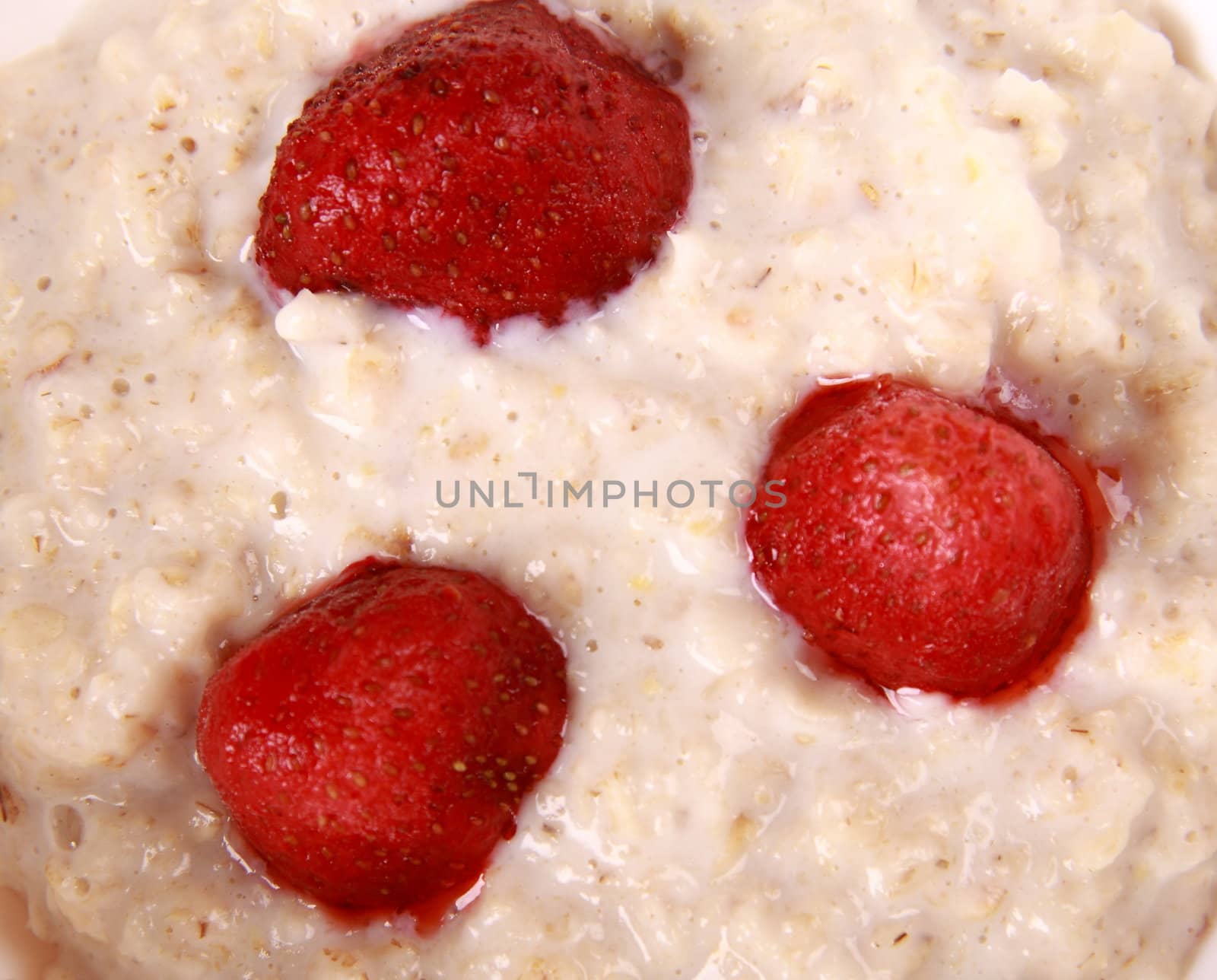 Fresh strawberries in porridge close up for you