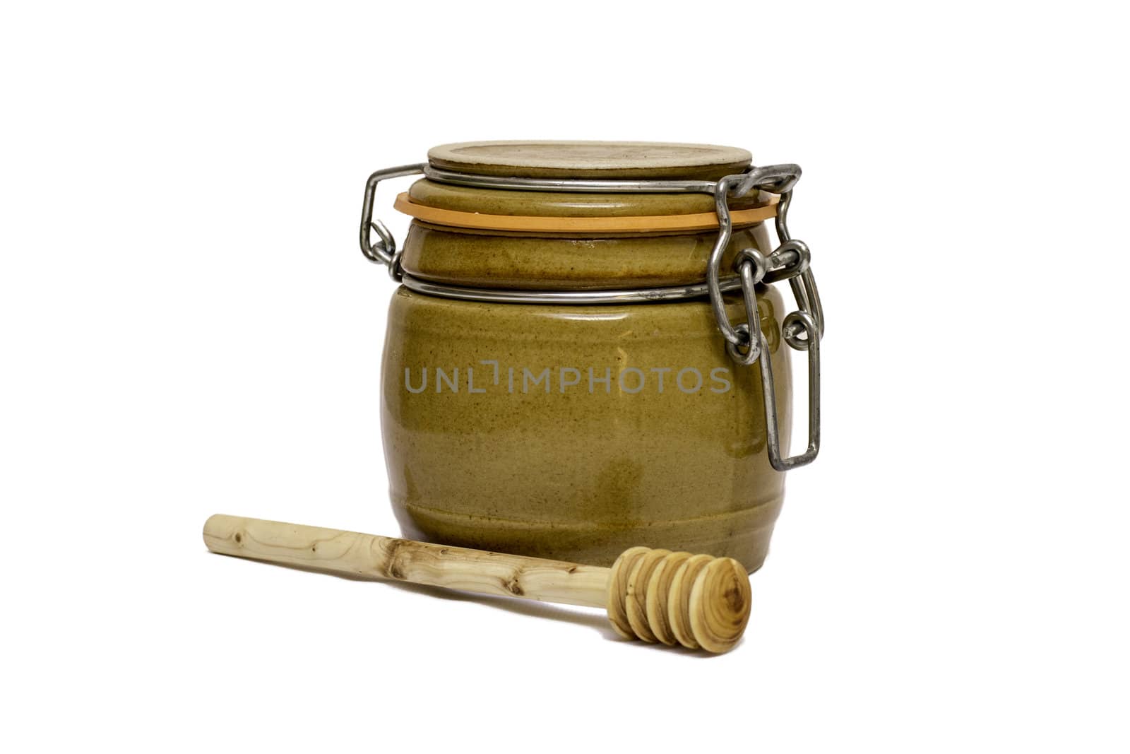 Honey pot isolated on white background close up