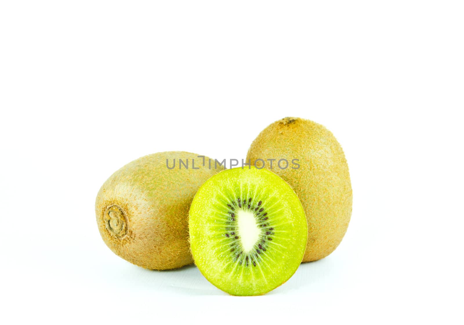 kiwi fruit and sliced segments isolated on white background