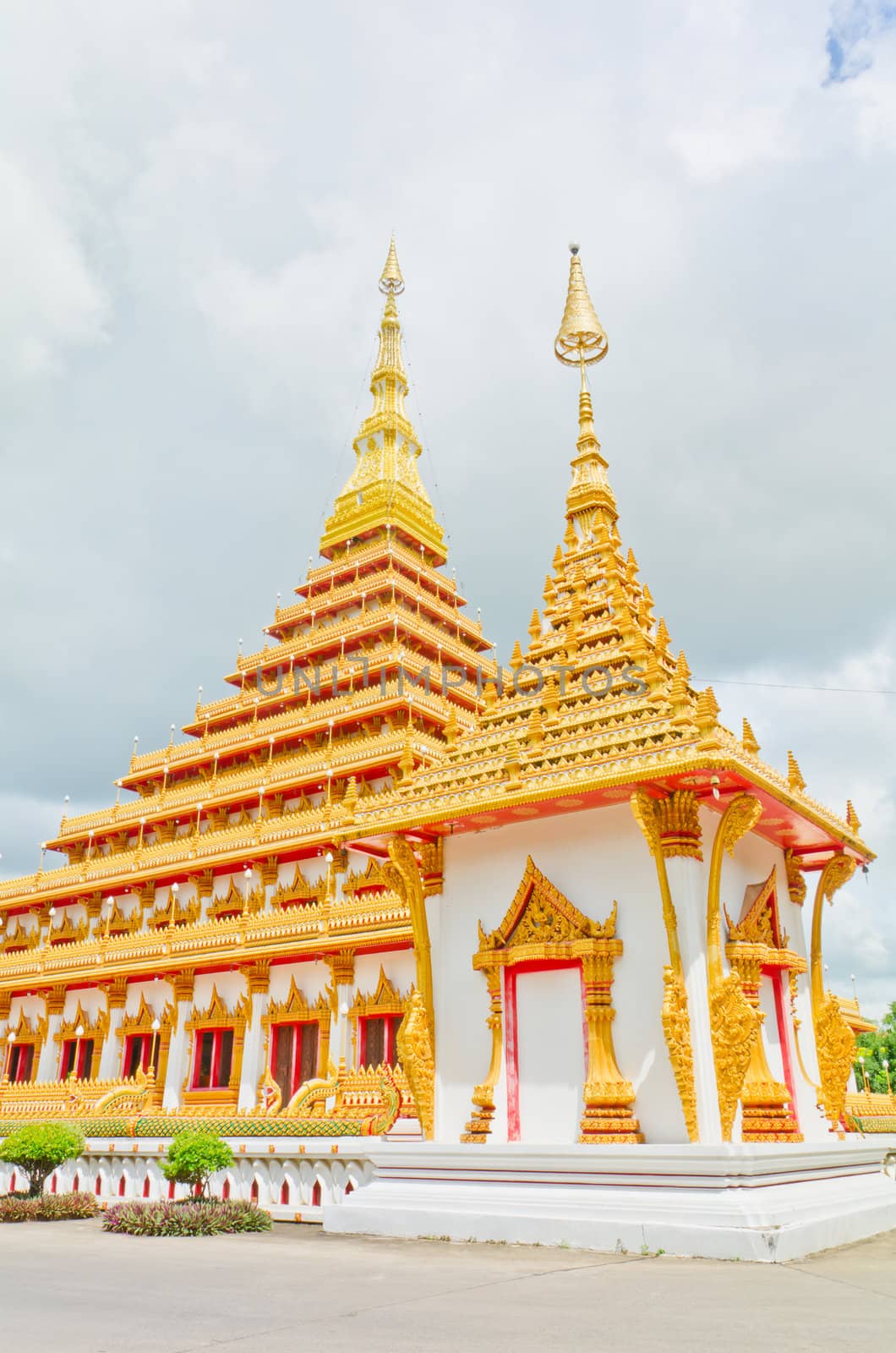 Golden pagoda at the Thai temple,
Buddha church at the Thai temple style