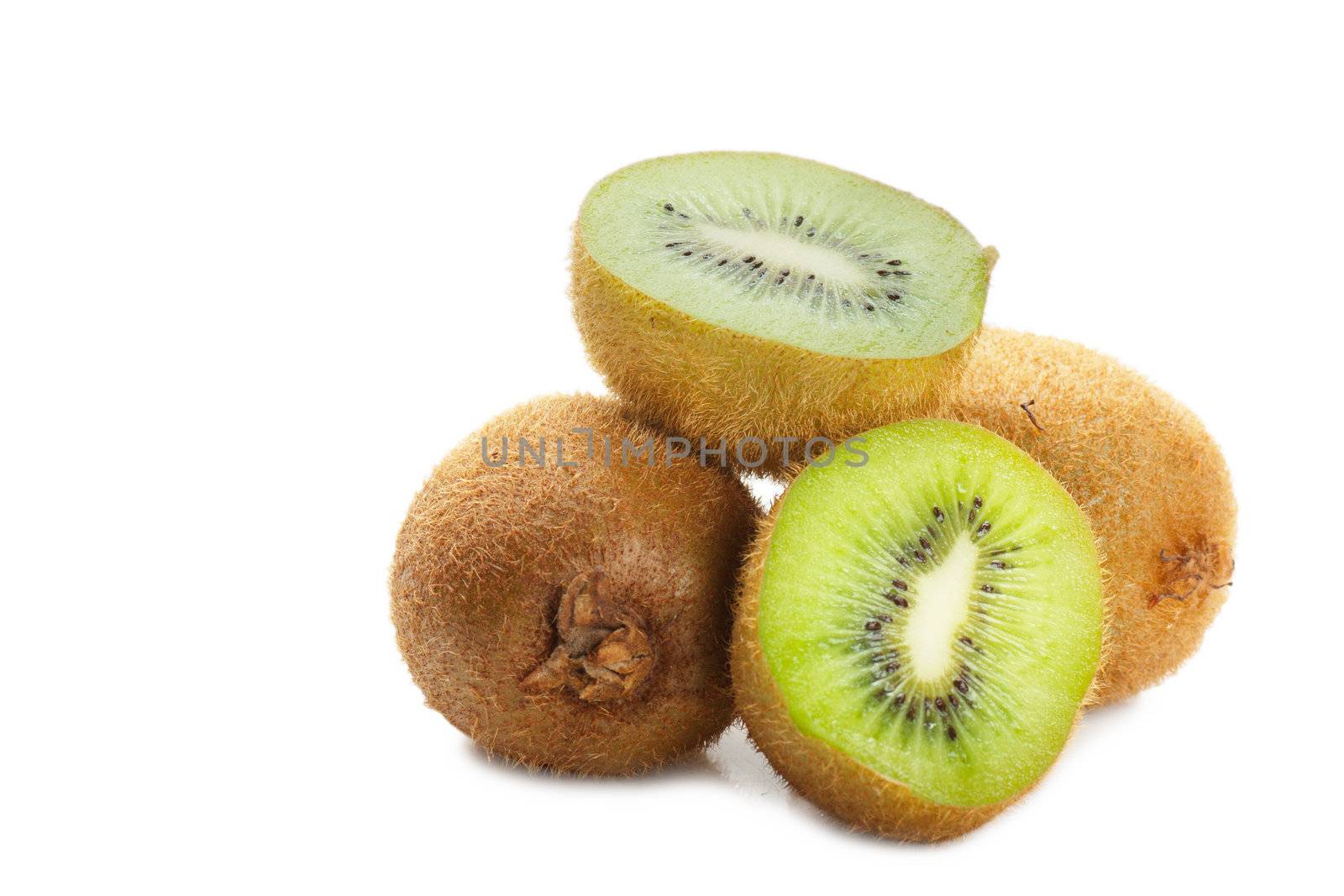 Closeup view of kiwi fruits over white background