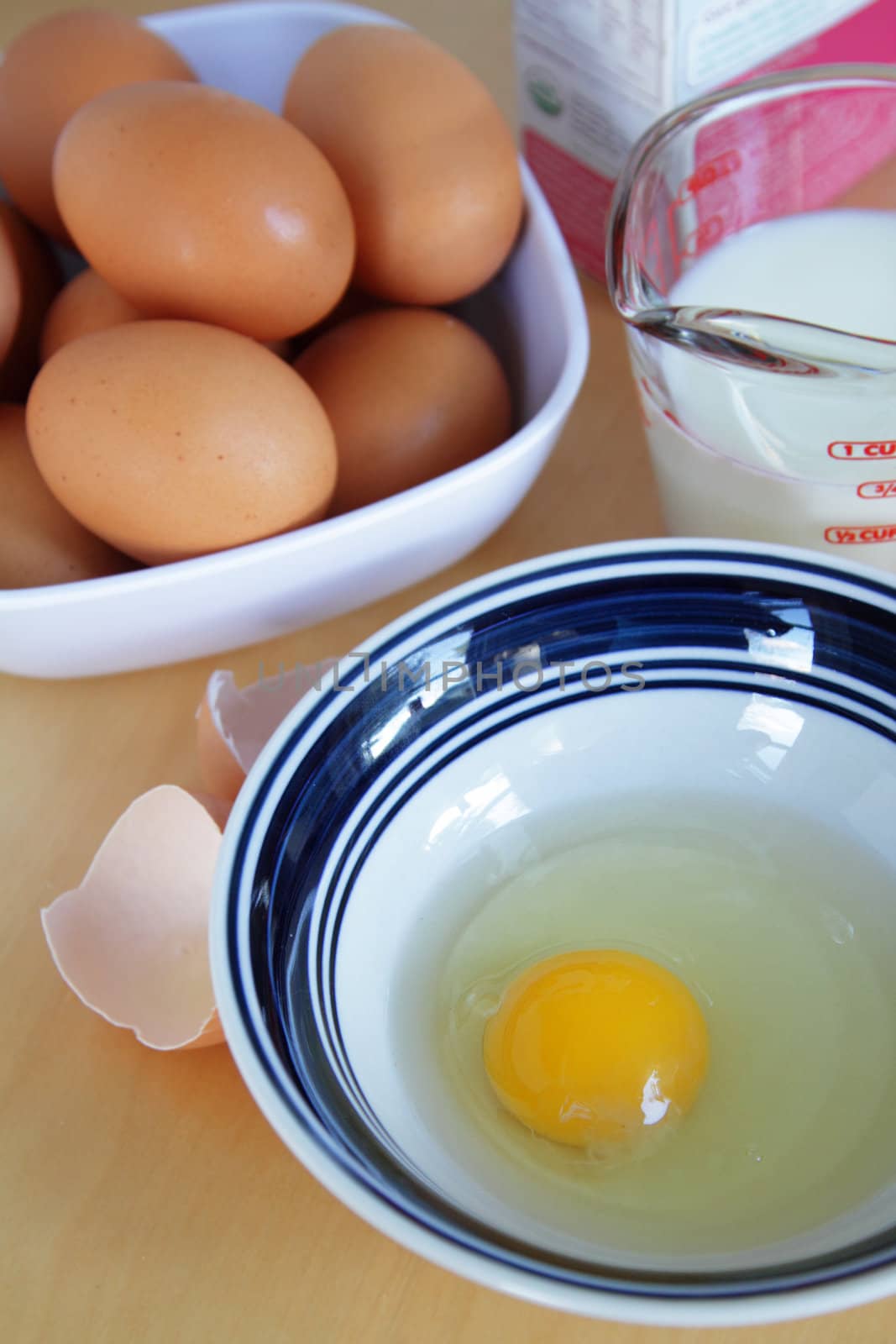 Cooking set with eggs and milk on the table