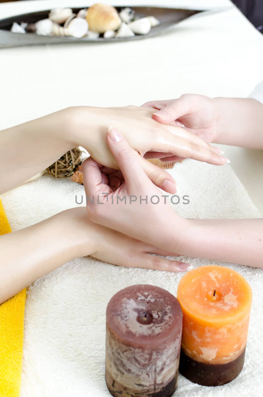 Hands massage in the spa salon