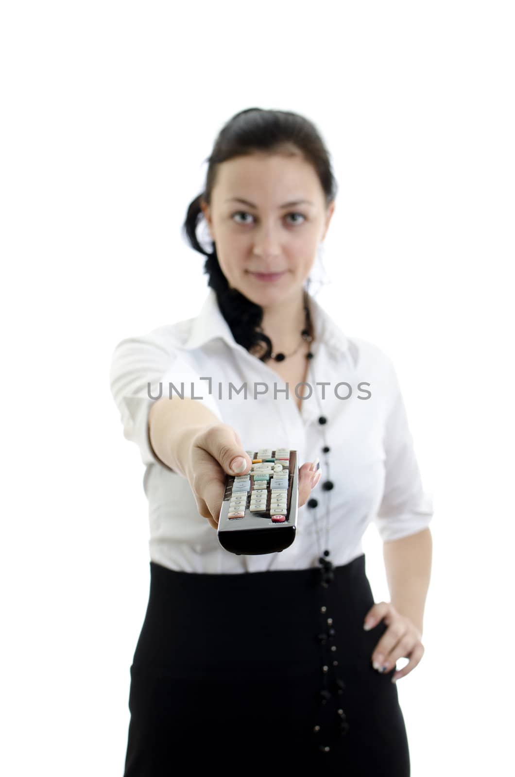 Woman holding remote control isolated on white background, focused on remote control