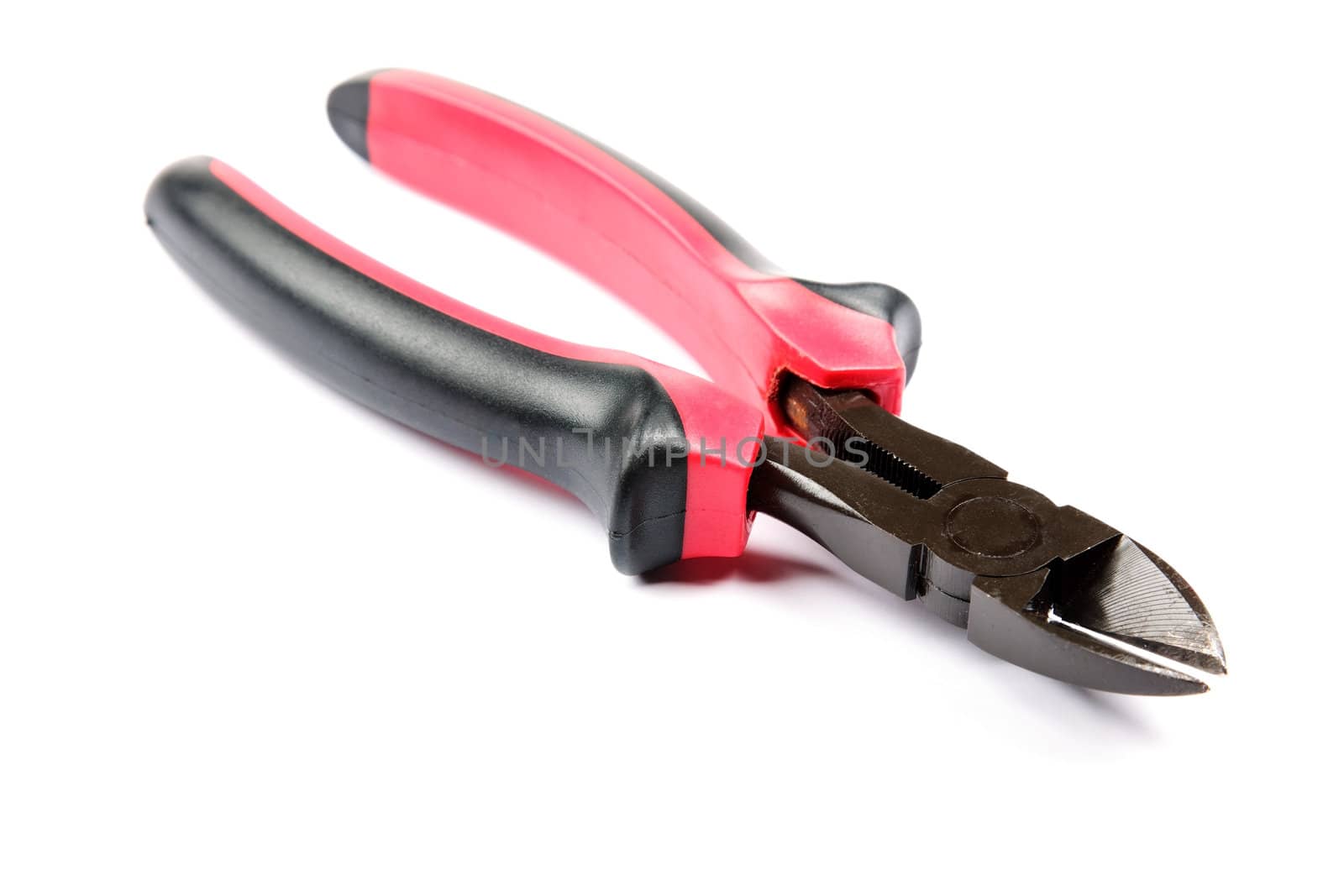 Red with black cutting pliers isolated on white background. by borodaev