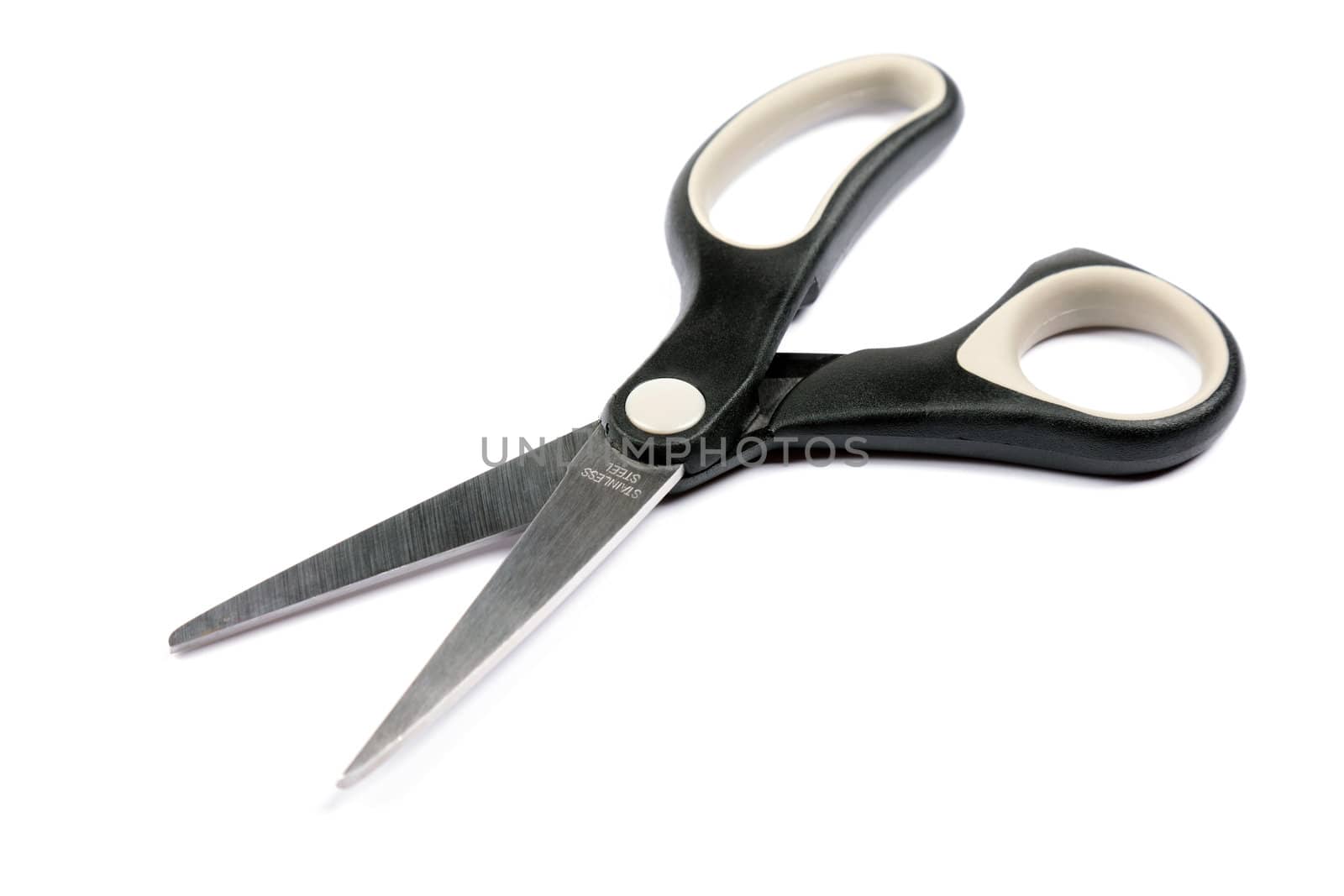 Black office scissors isolated on white background. Full frame studio shot.