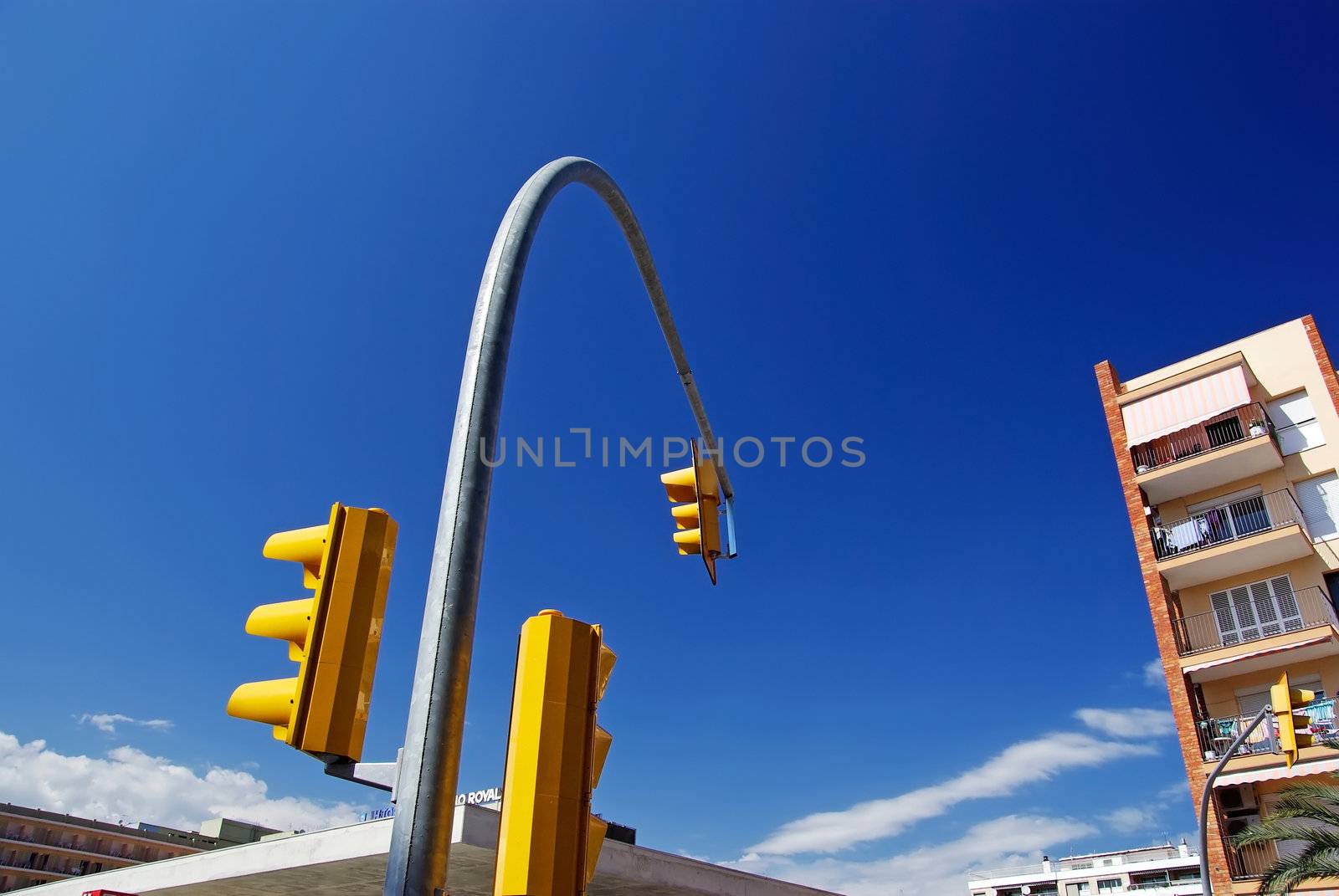 Curve composition with yellow street-traffic control lights. Llo by borodaev