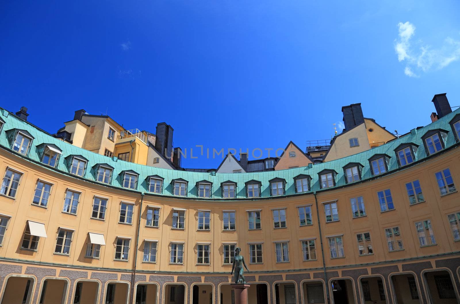 Big old yellow architecture in Stockholm, Sweden. by borodaev