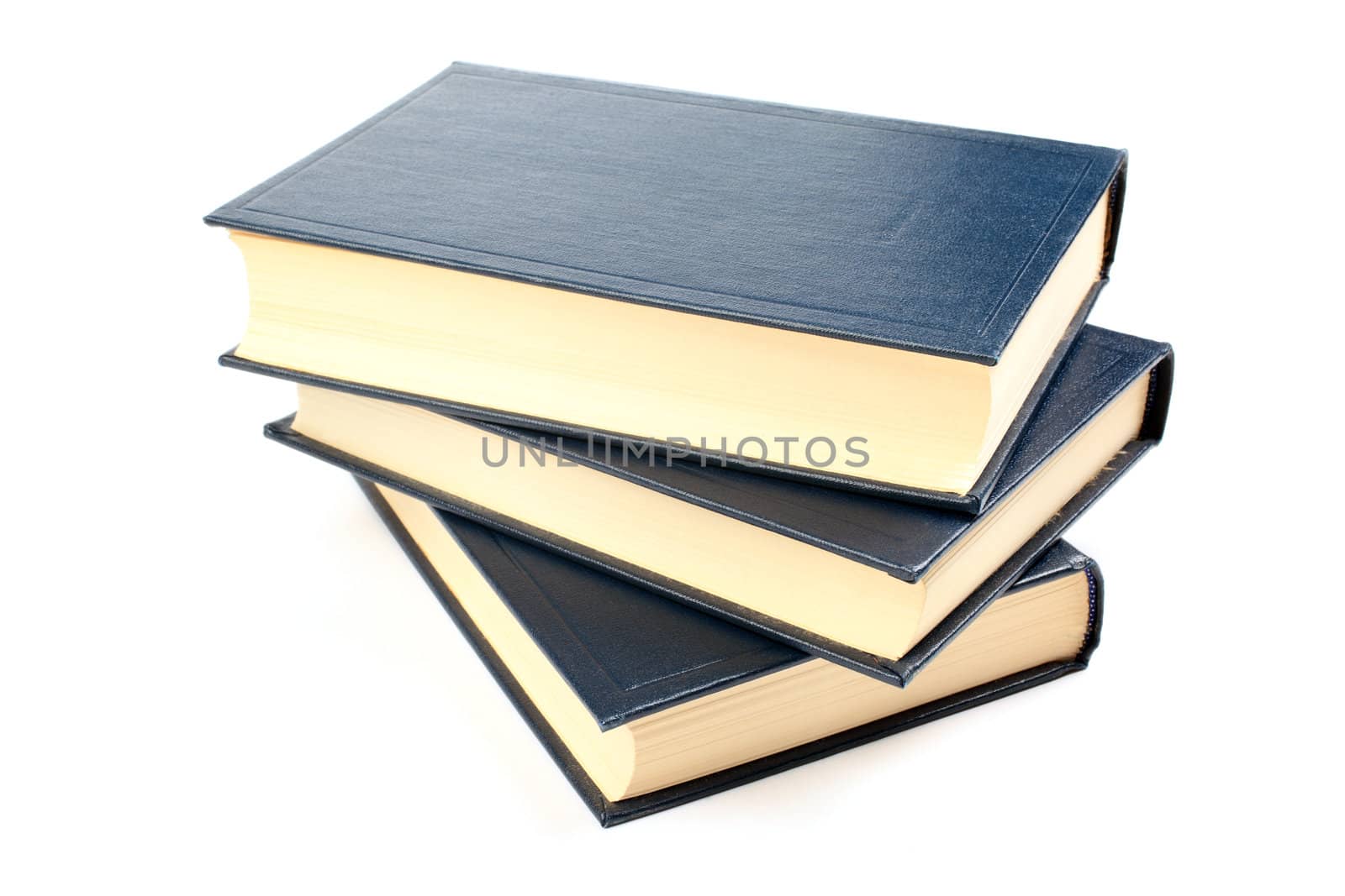 Three old books with yellowed pages isolated on white background.