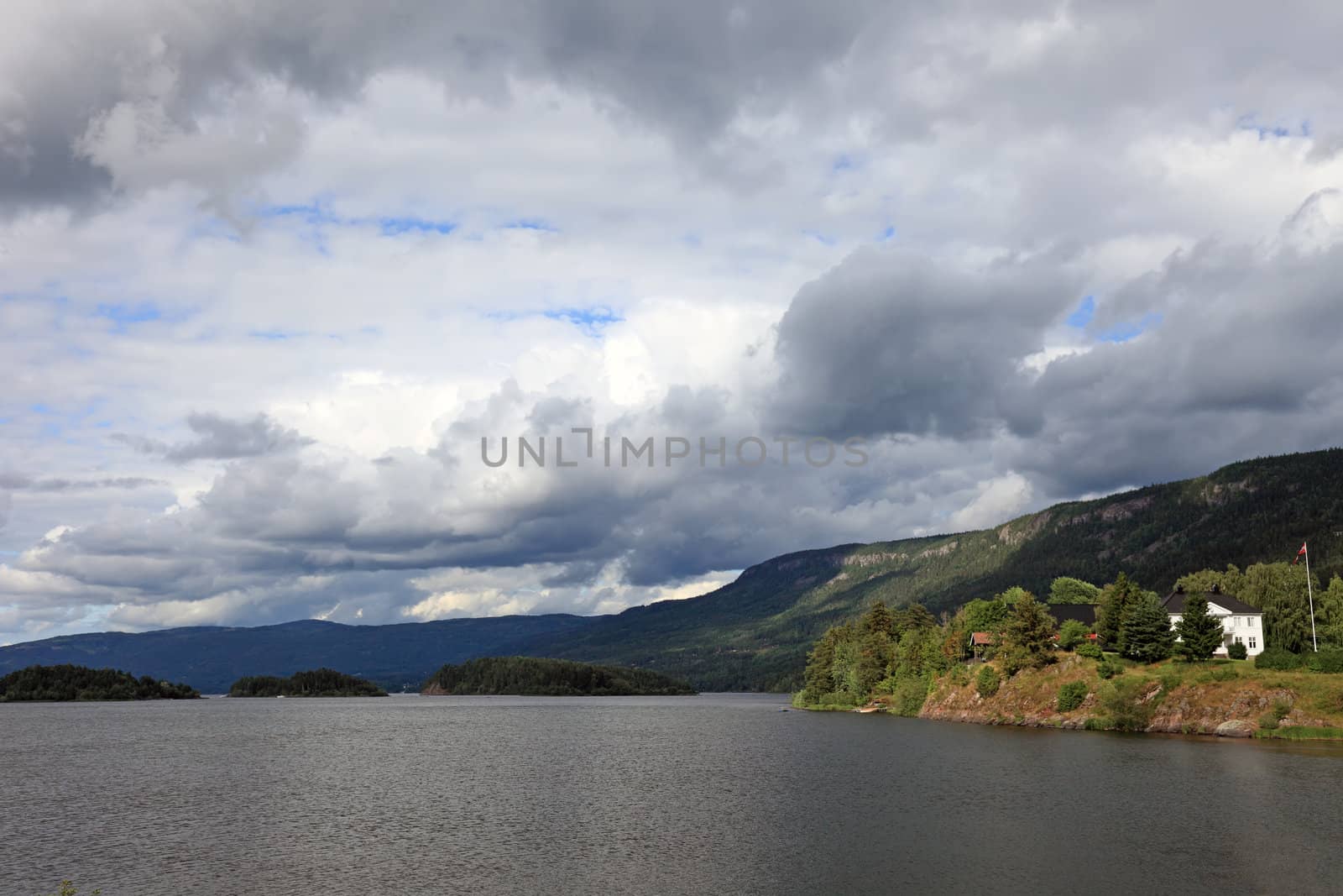 Norway lake view in summer. Tungsten landscape.