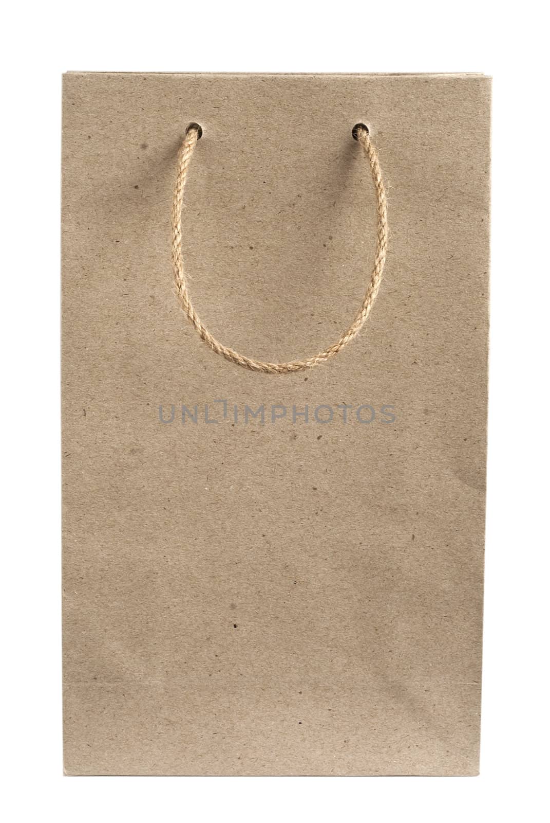 Recycled paper bag with hemp rope handles isolated on white background