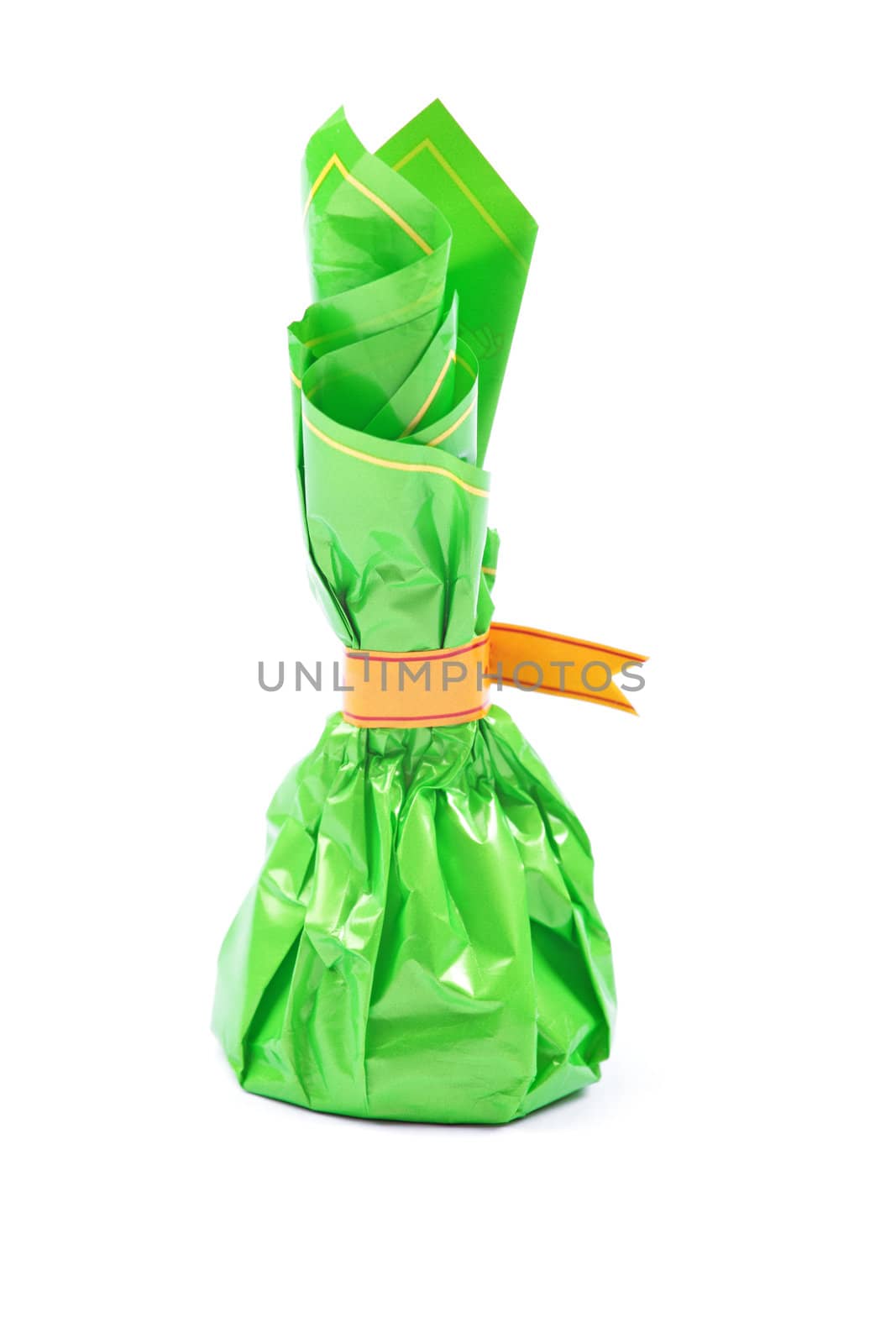 Studio shot of chocolate sweet in green package isolated on whit by borodaev