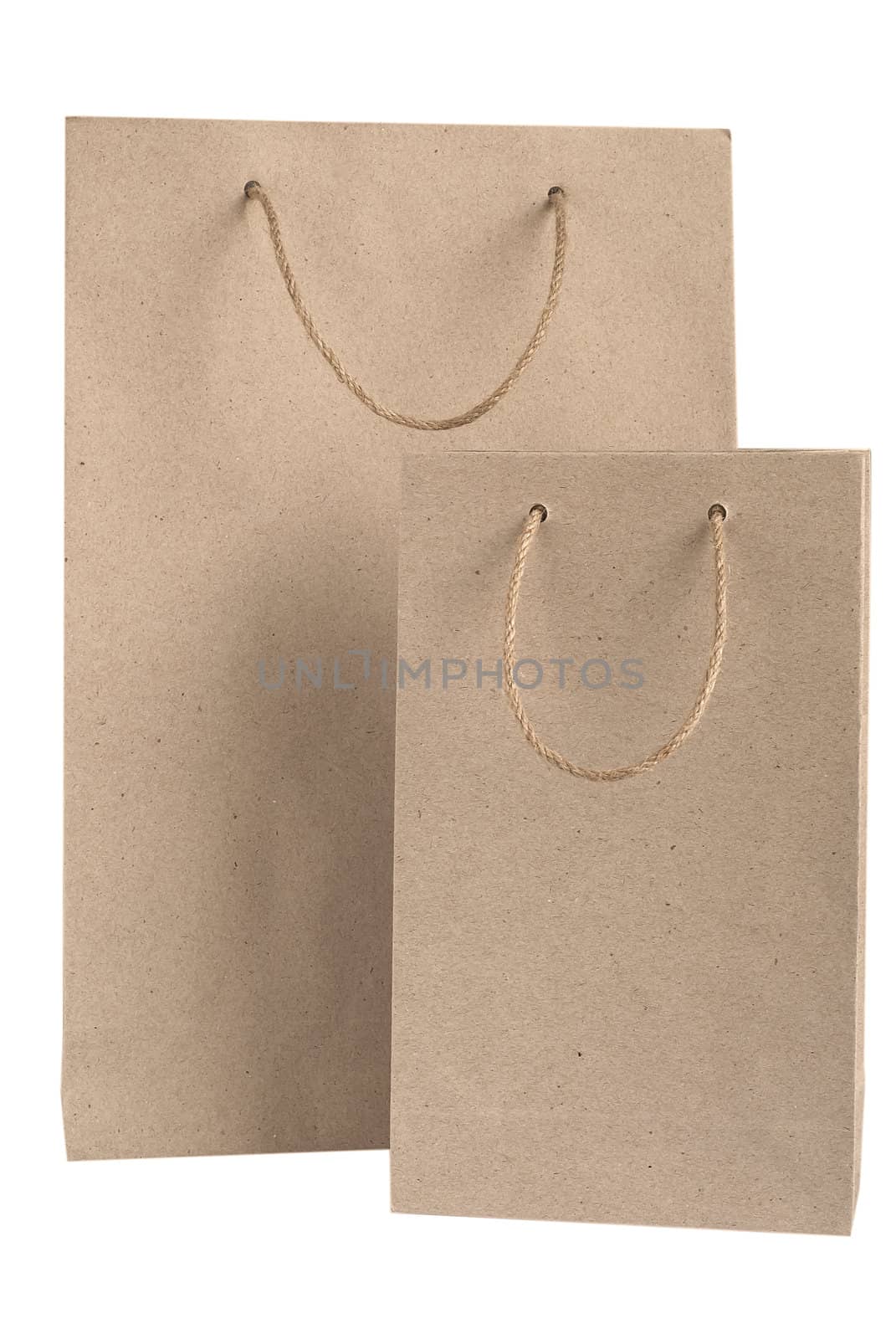 Recycled paper bags with hemp rope handles isolated on white background







Recycled paper bag with hemp rope handles isolated on white background