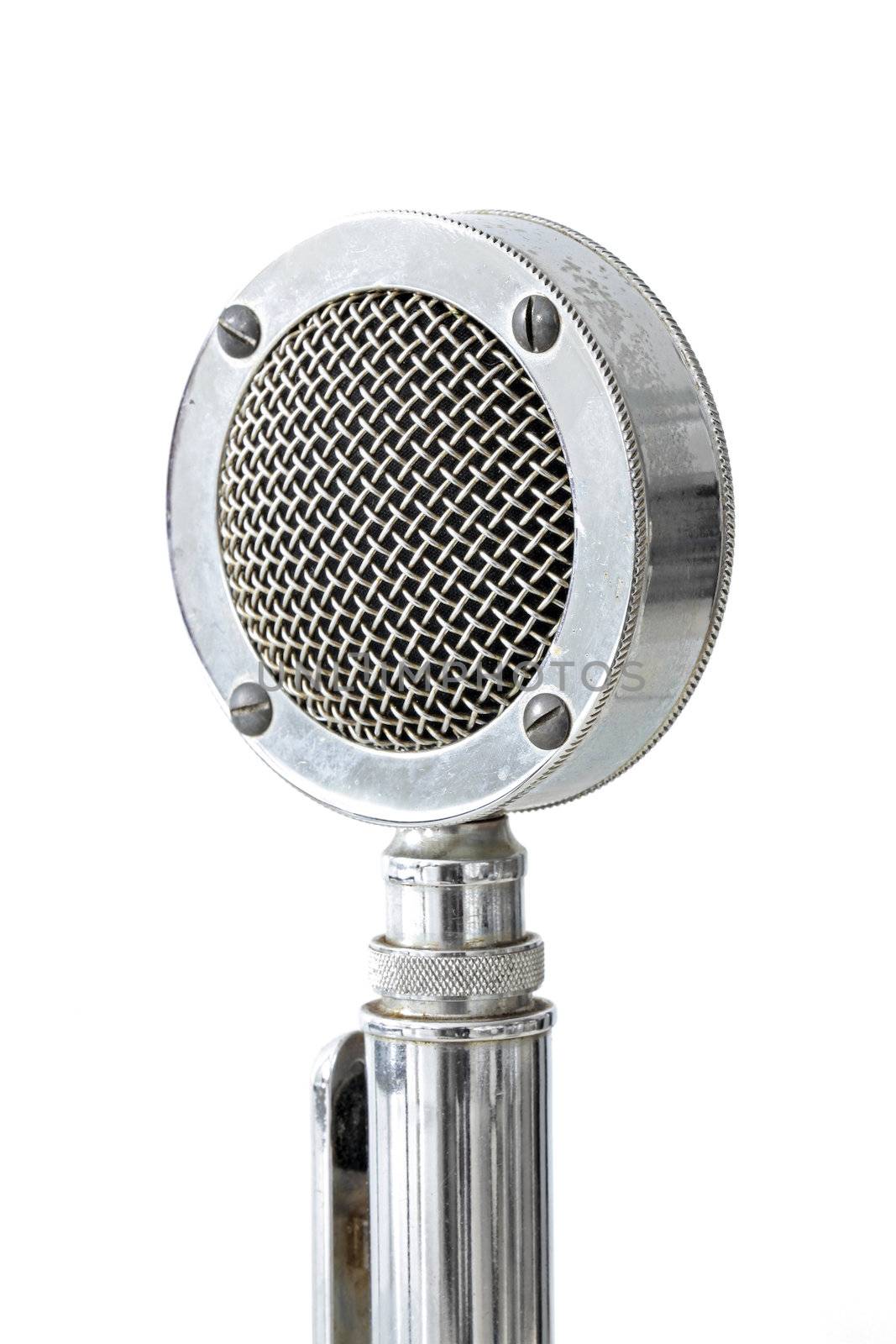 macro shot of vintage microphone on white background