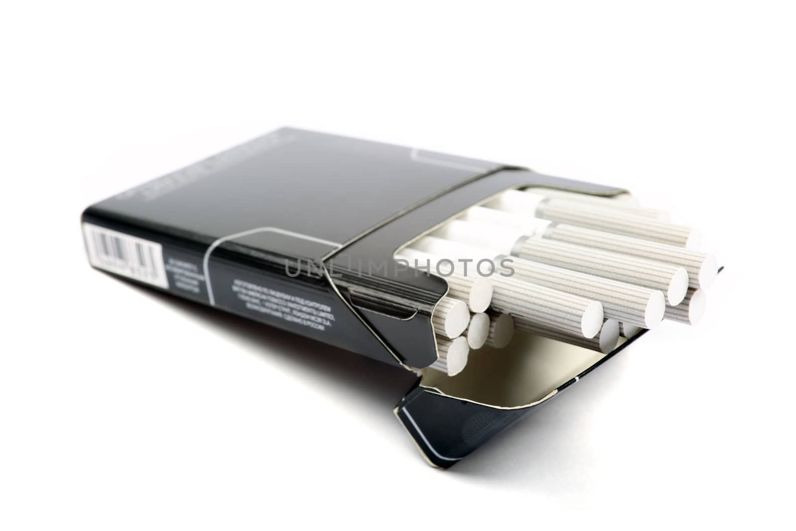 Black pack of cigarettes isolated on white background.