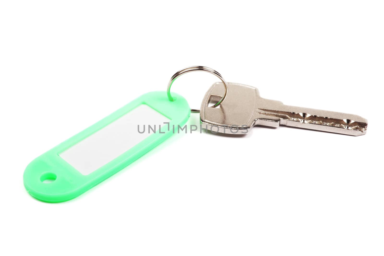 Key and green trinket with empty for your design space isolated  by borodaev