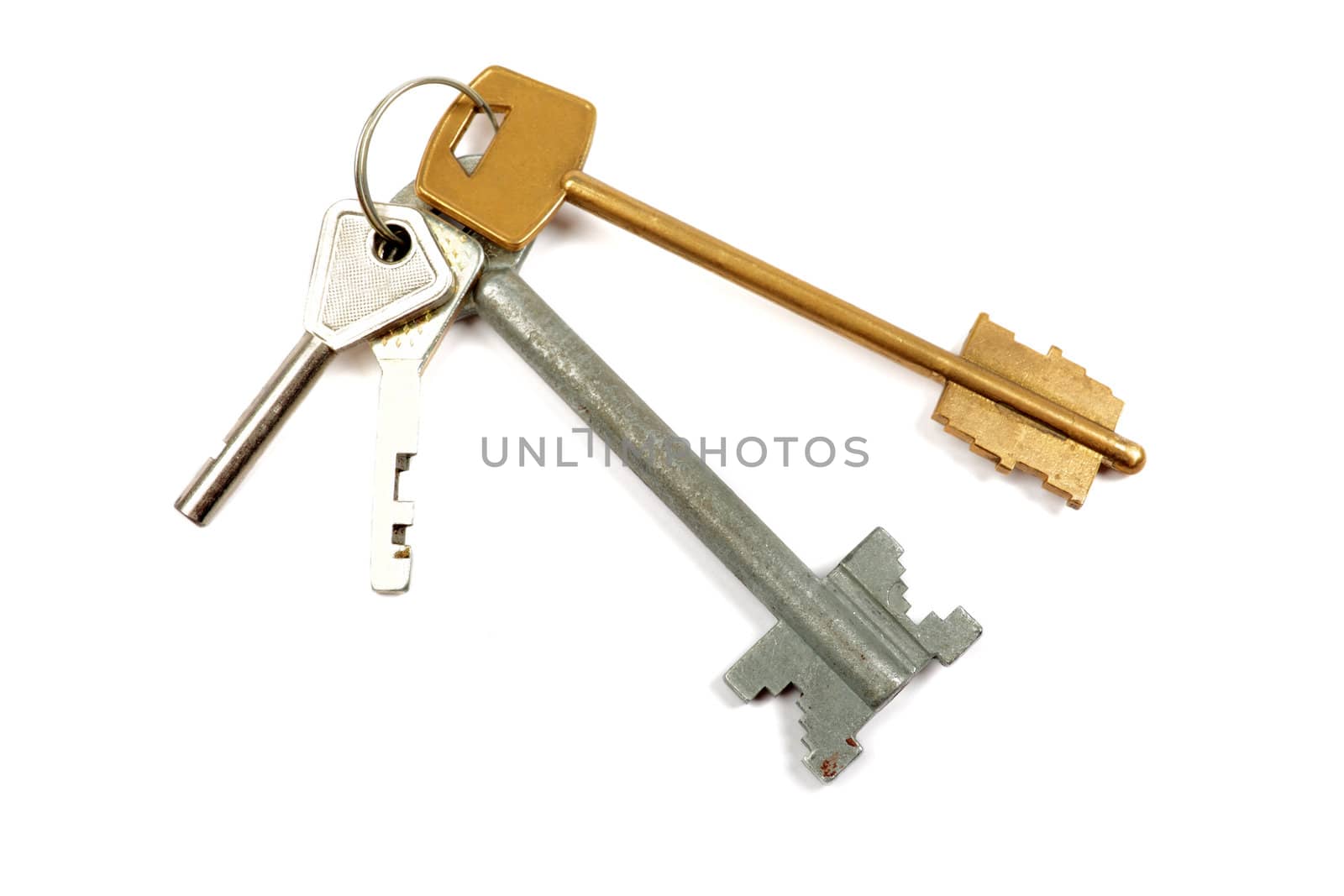 Bunch of keys isolated on the white background. by borodaev