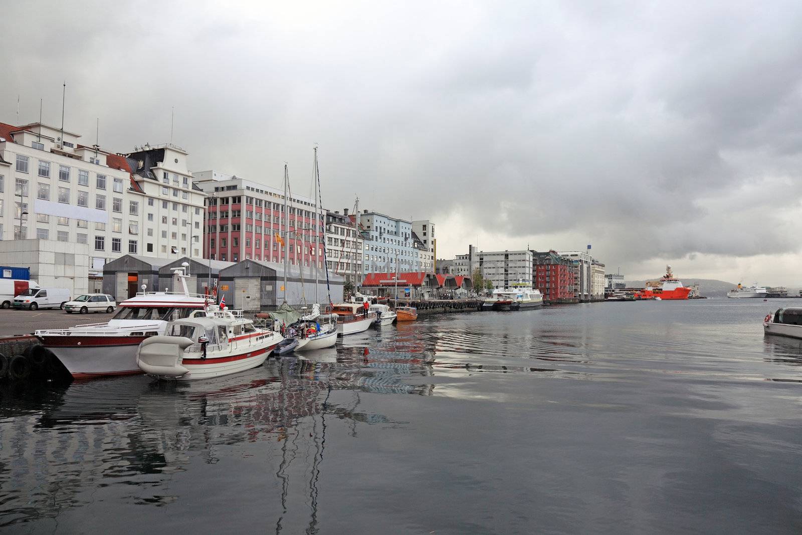 Norwegian harbor of the city of Bergen. Dramatic weather, scandi by borodaev