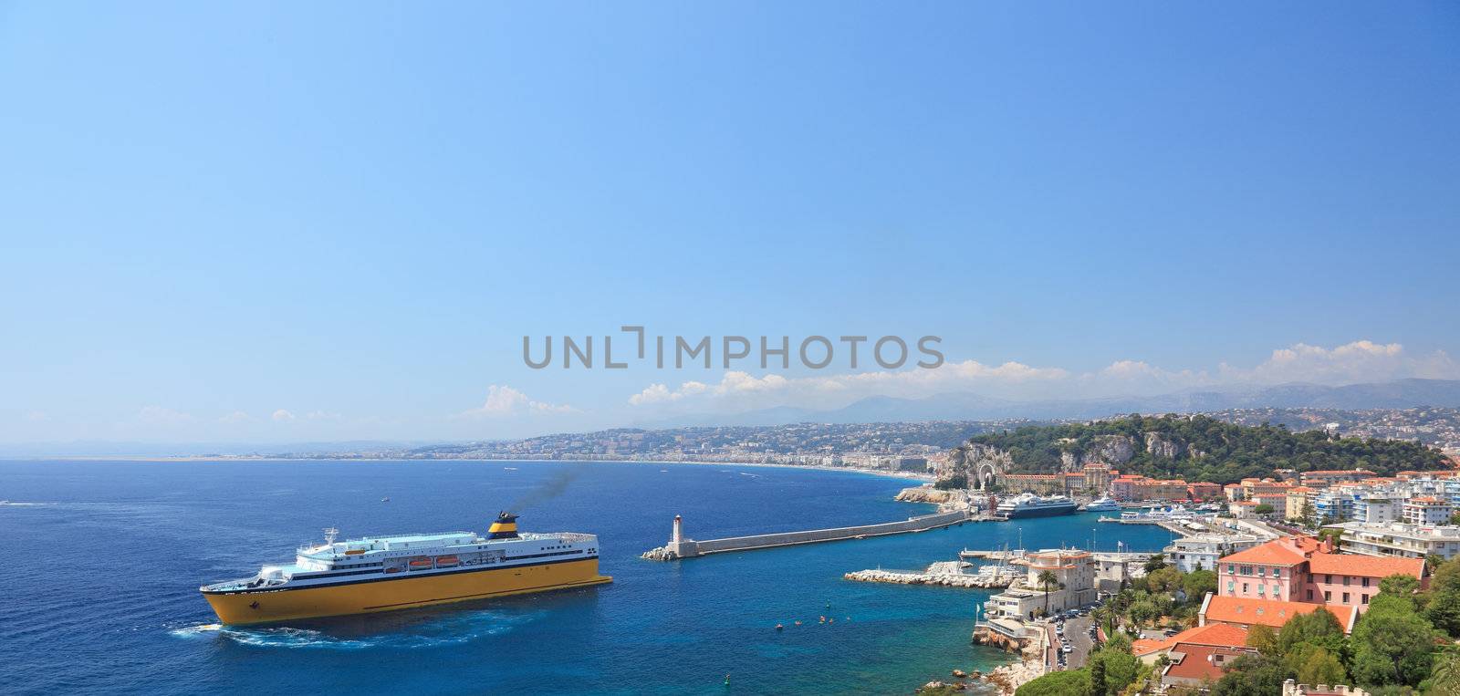 Summer view of the city of Nice and the harbor with crusie ship.