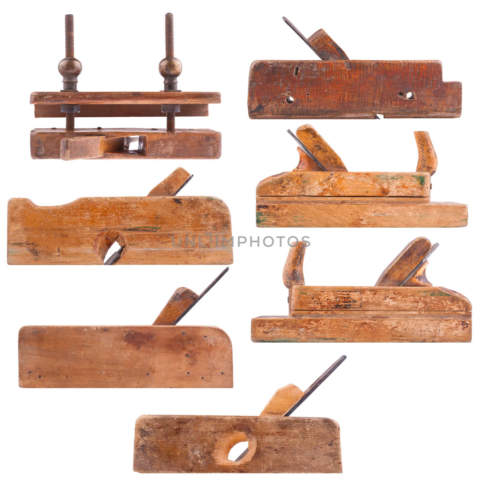 Collection of antique woodworking tools, isolated on white