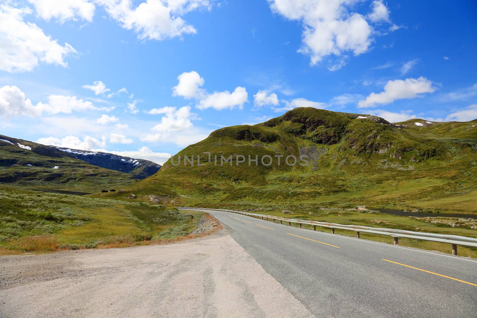 Norwegian road, situated deep in the mountains, Scandinavian Europe landscapes.