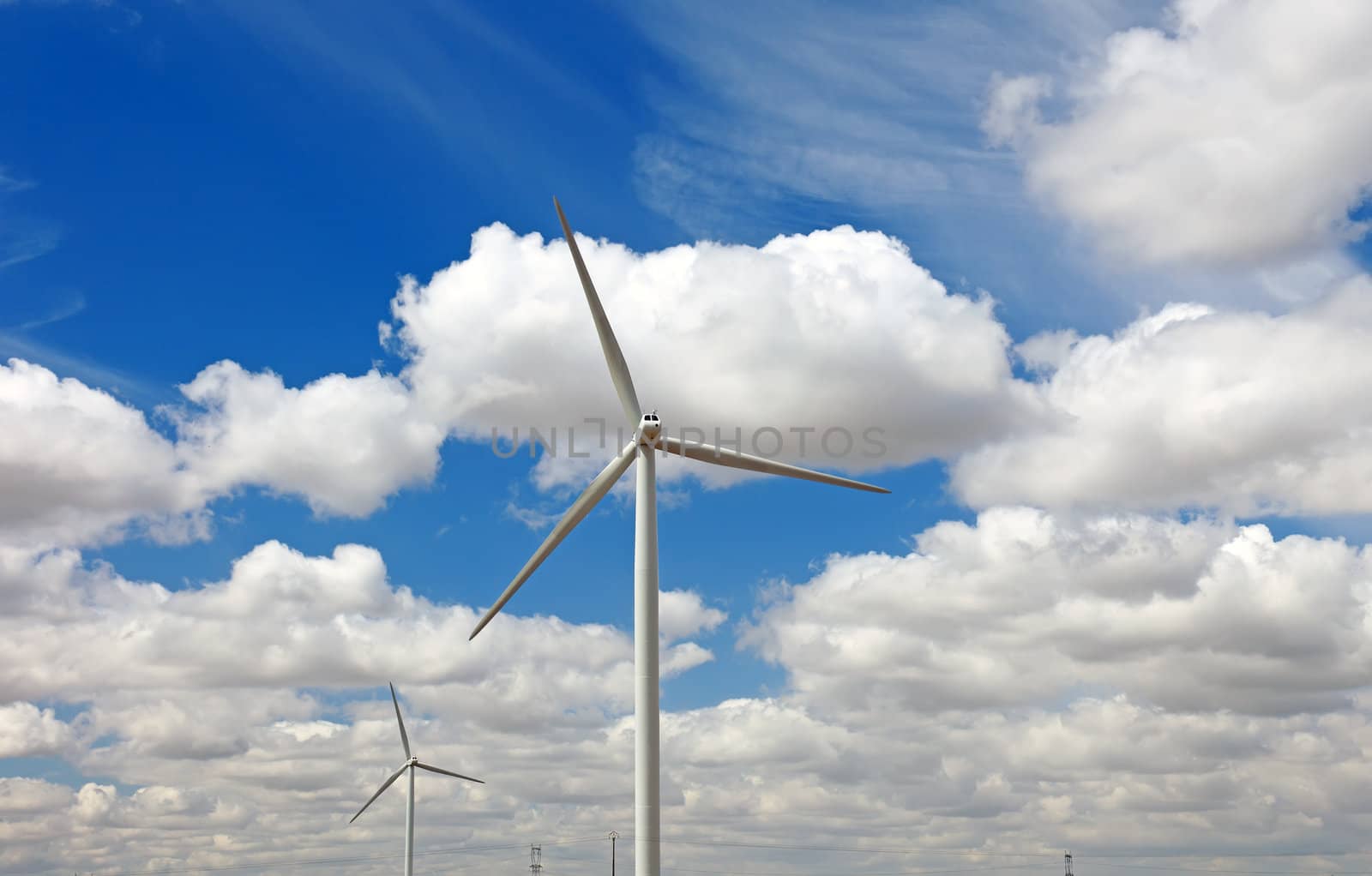 Wind power generator and blue sky, France, Europe.