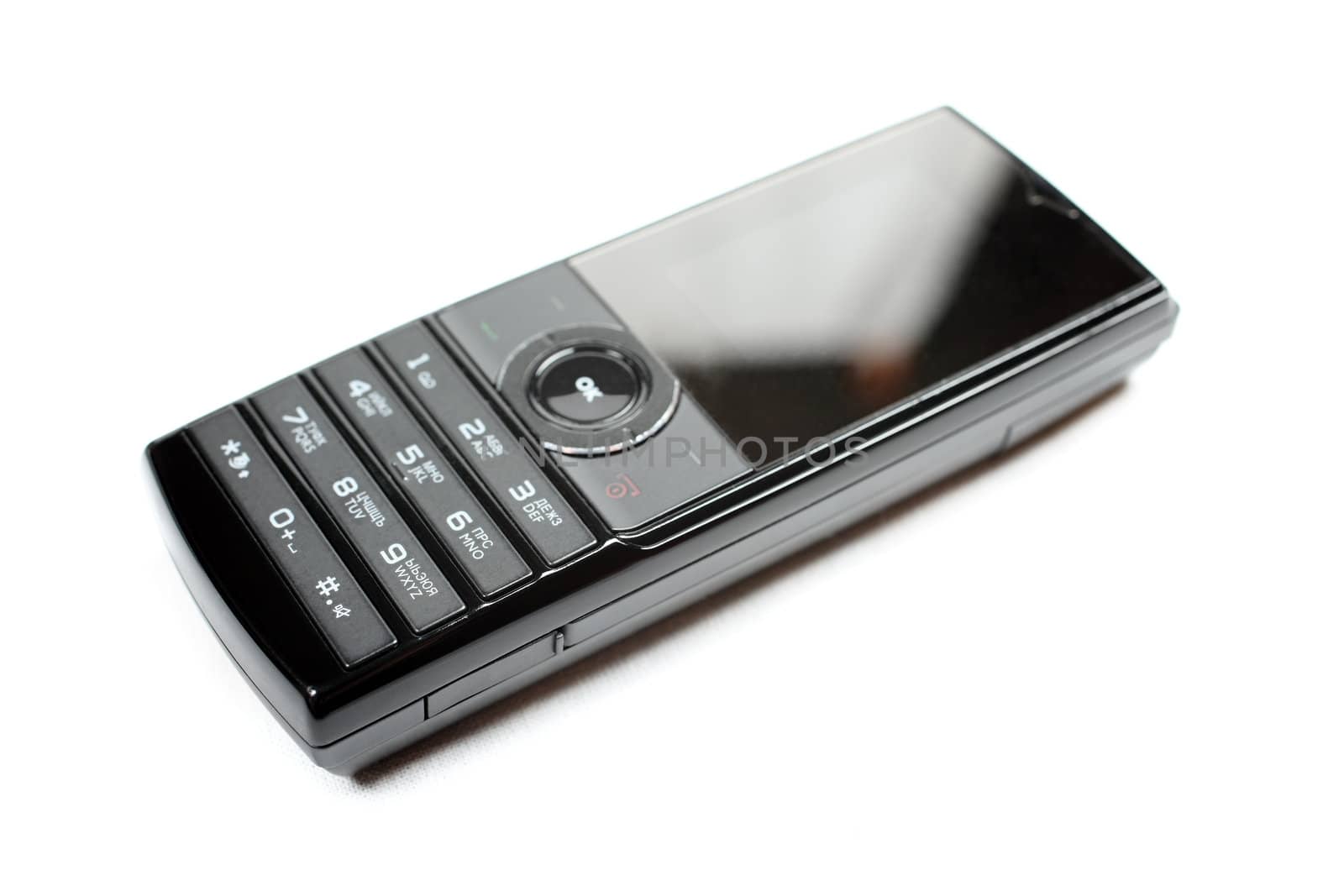 Black mobile phone isolated on white background.
