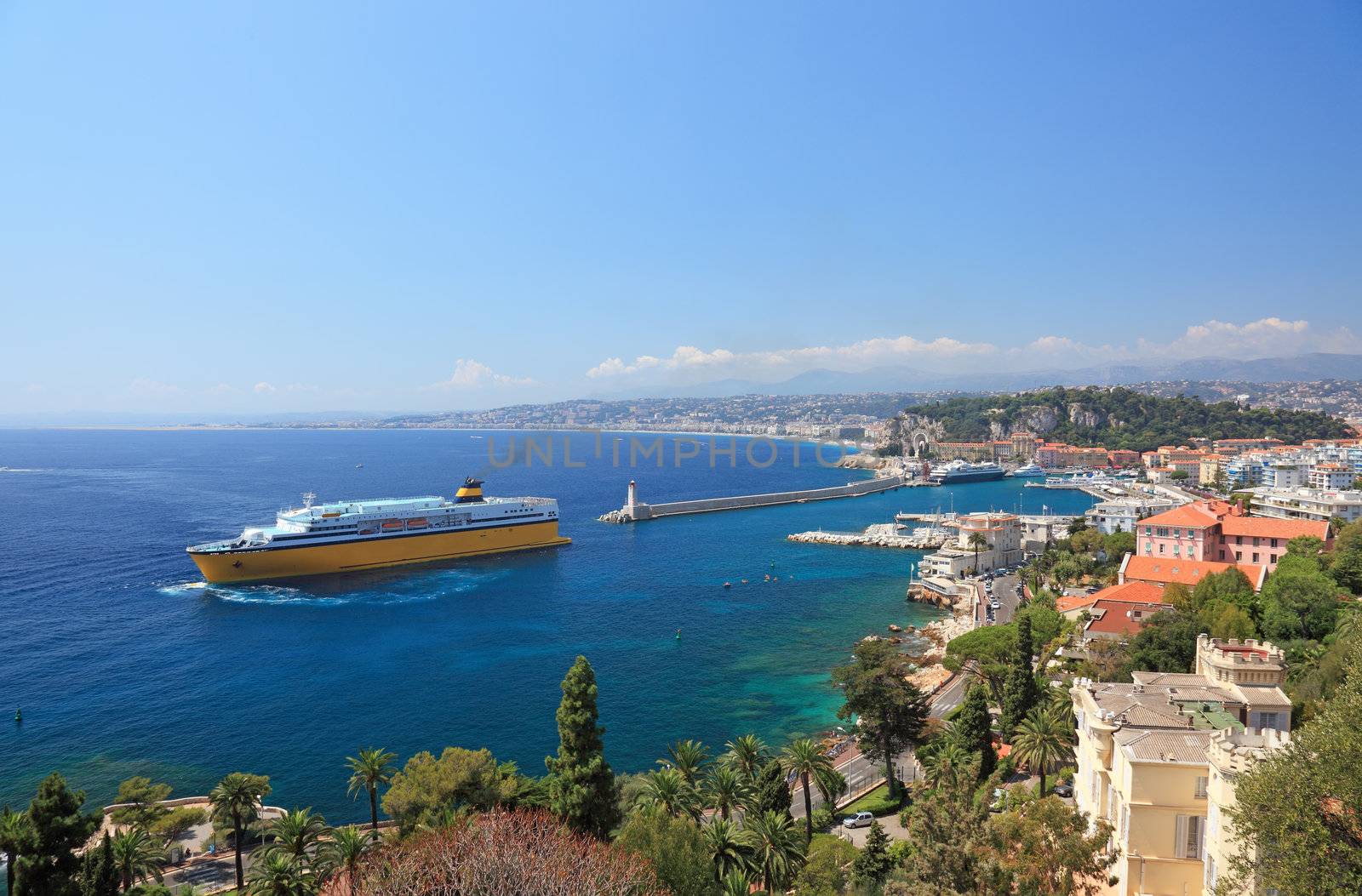 Summer view of the city of Nice and the harbor with crusie ship.