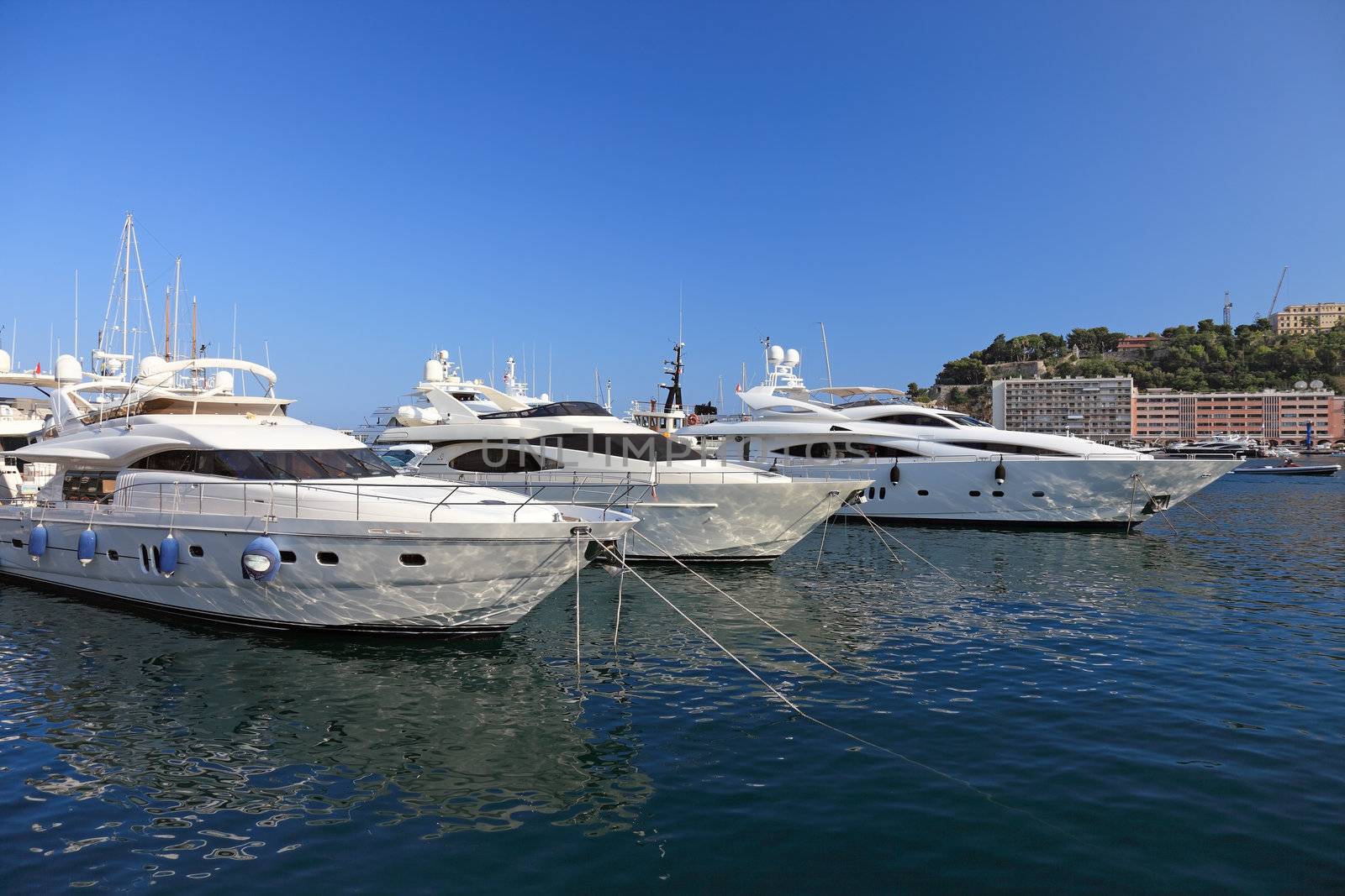 Very expensive luxury yachts in harbor of Monaco principality.