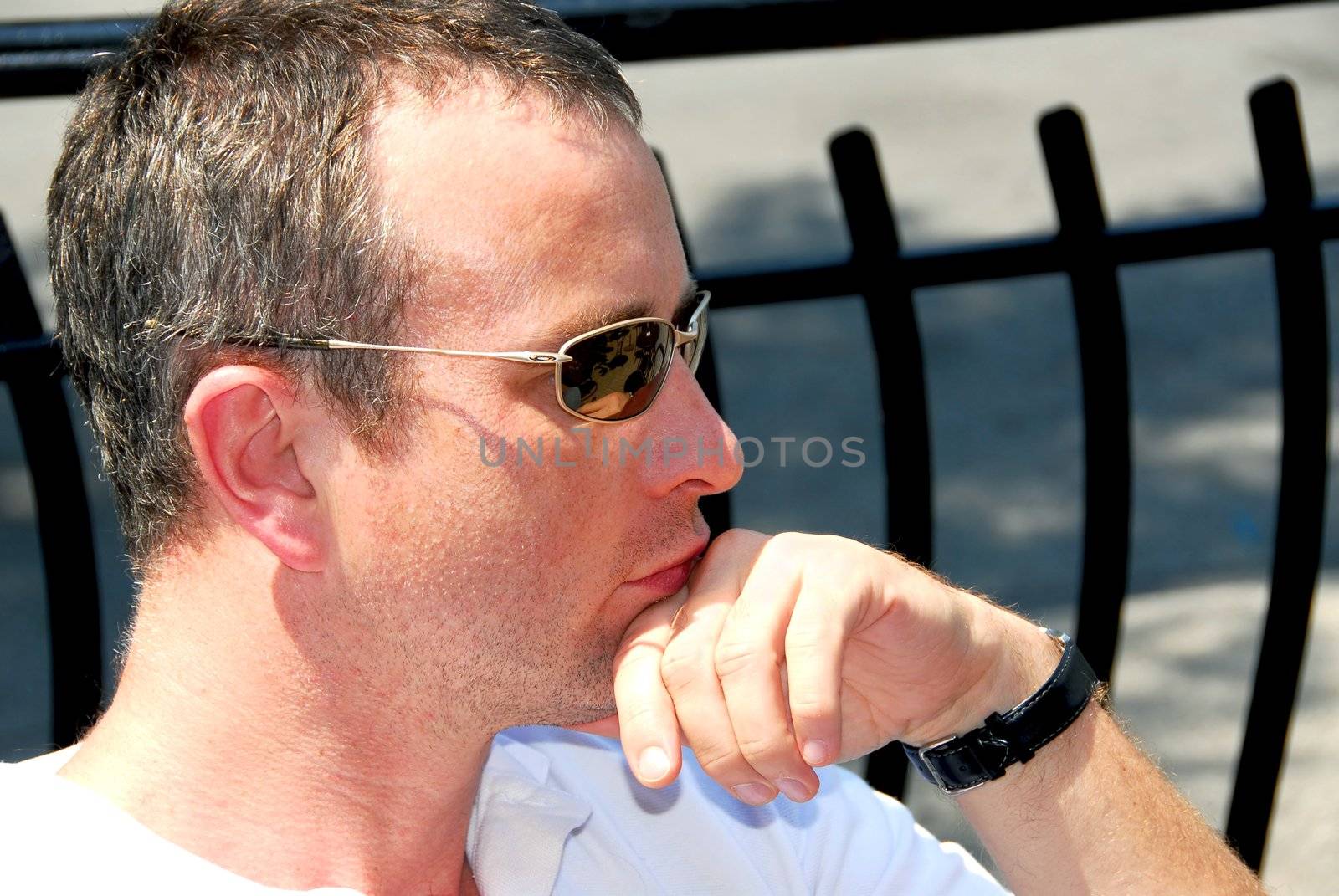 Portrait of a man wearing sunglasses in outdoor cafe