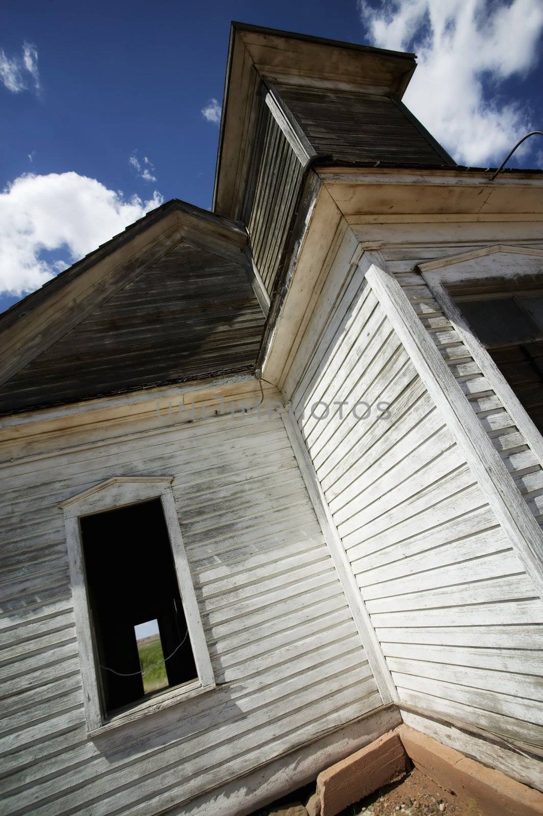 Abandoned church from the ground looking up with a very wide lens.