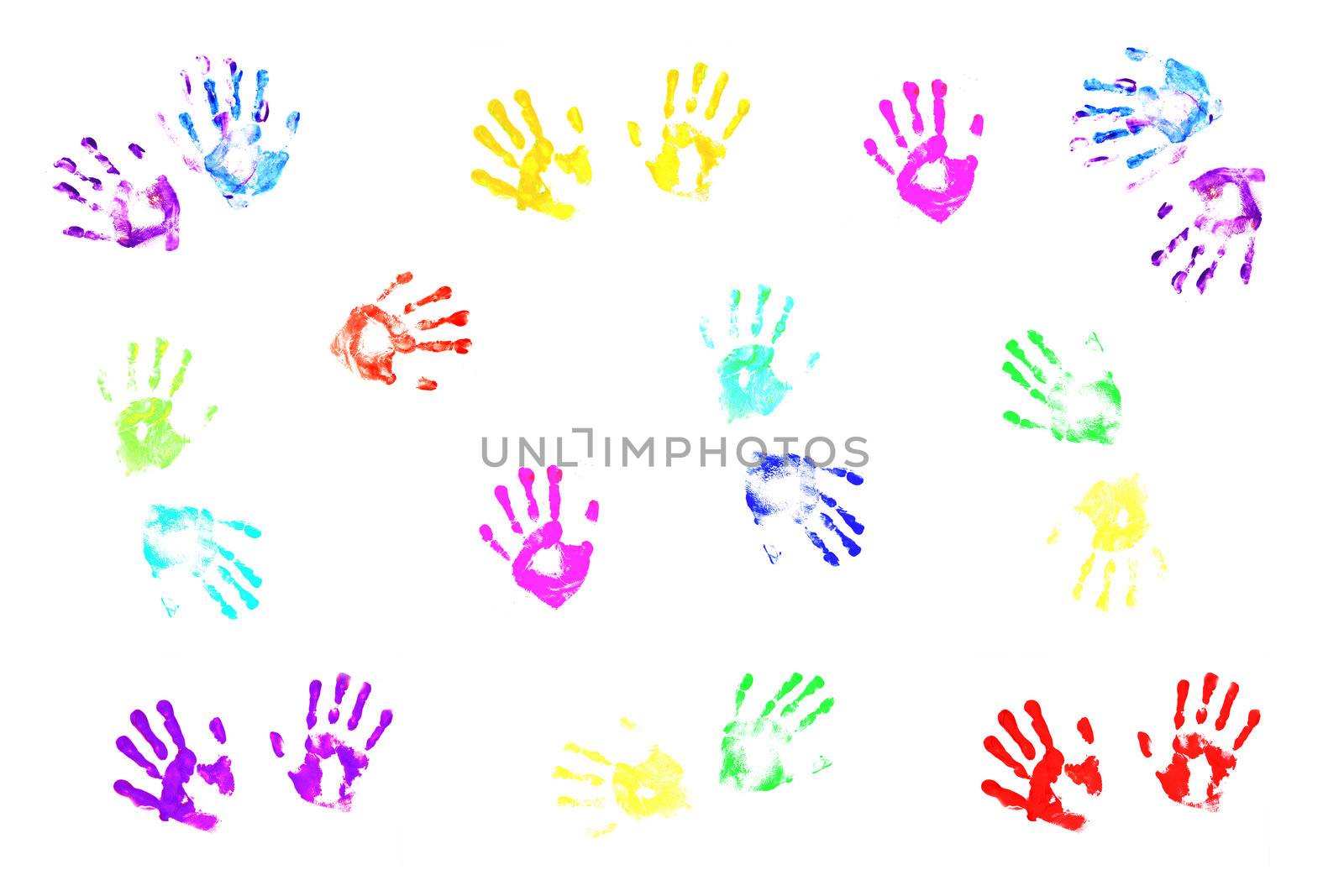 Colorful handprints made by children on white background.; by jarenwicklund