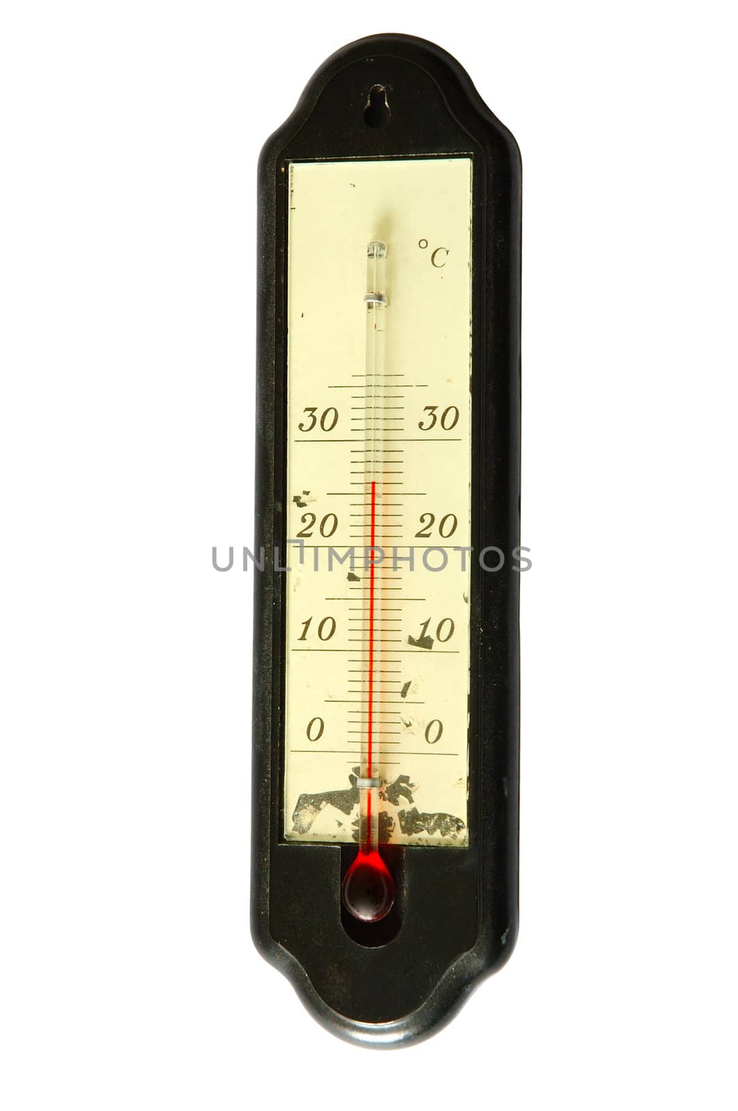 Old alcohol thermometer with Celsius scale in isolated background.