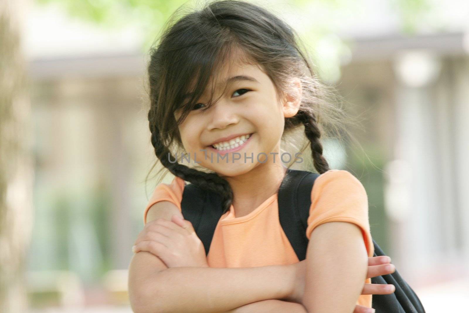 Adorable five year old girl ready for first day of school;