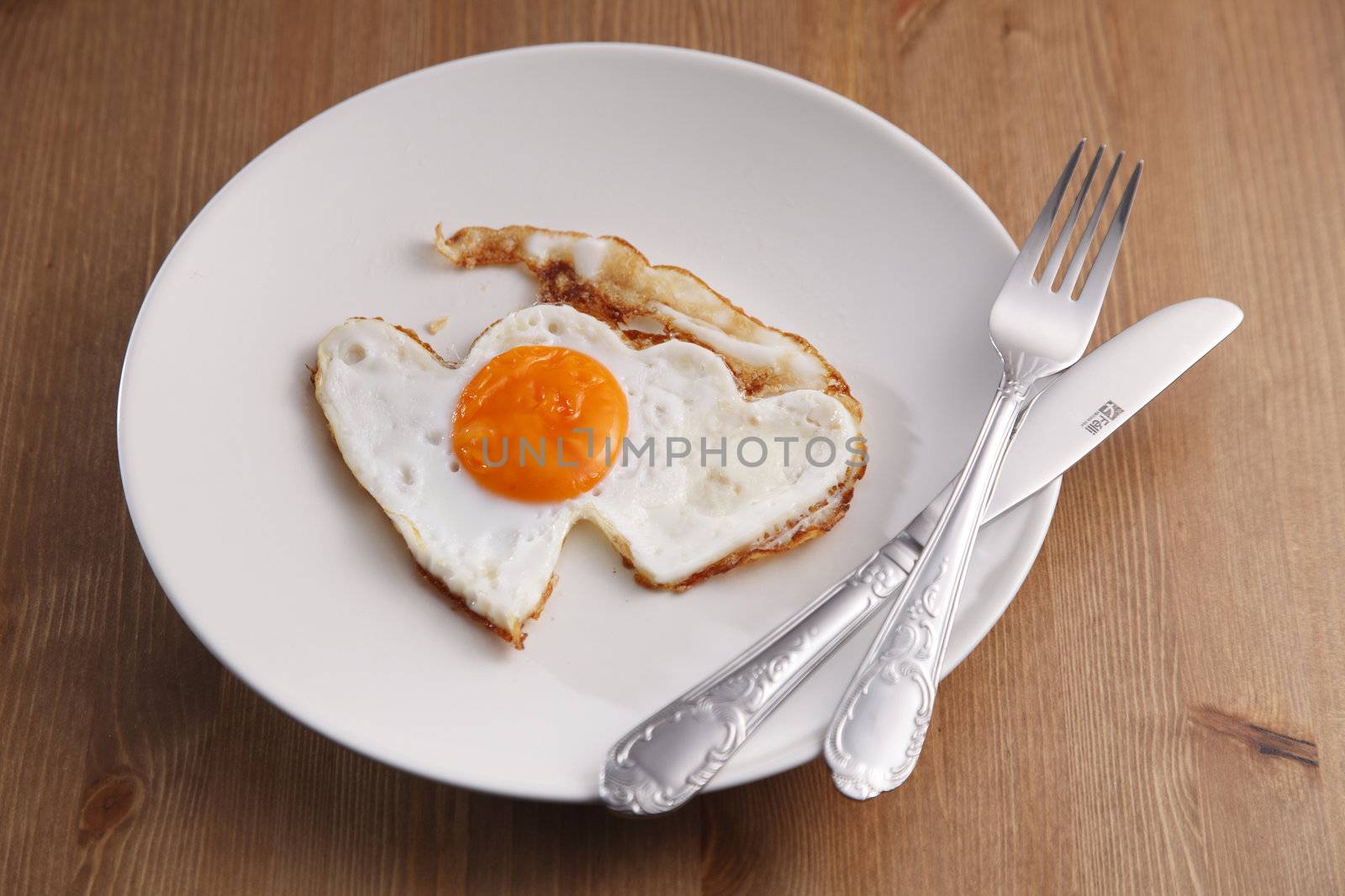 romance breakfast with heart shape fried egg