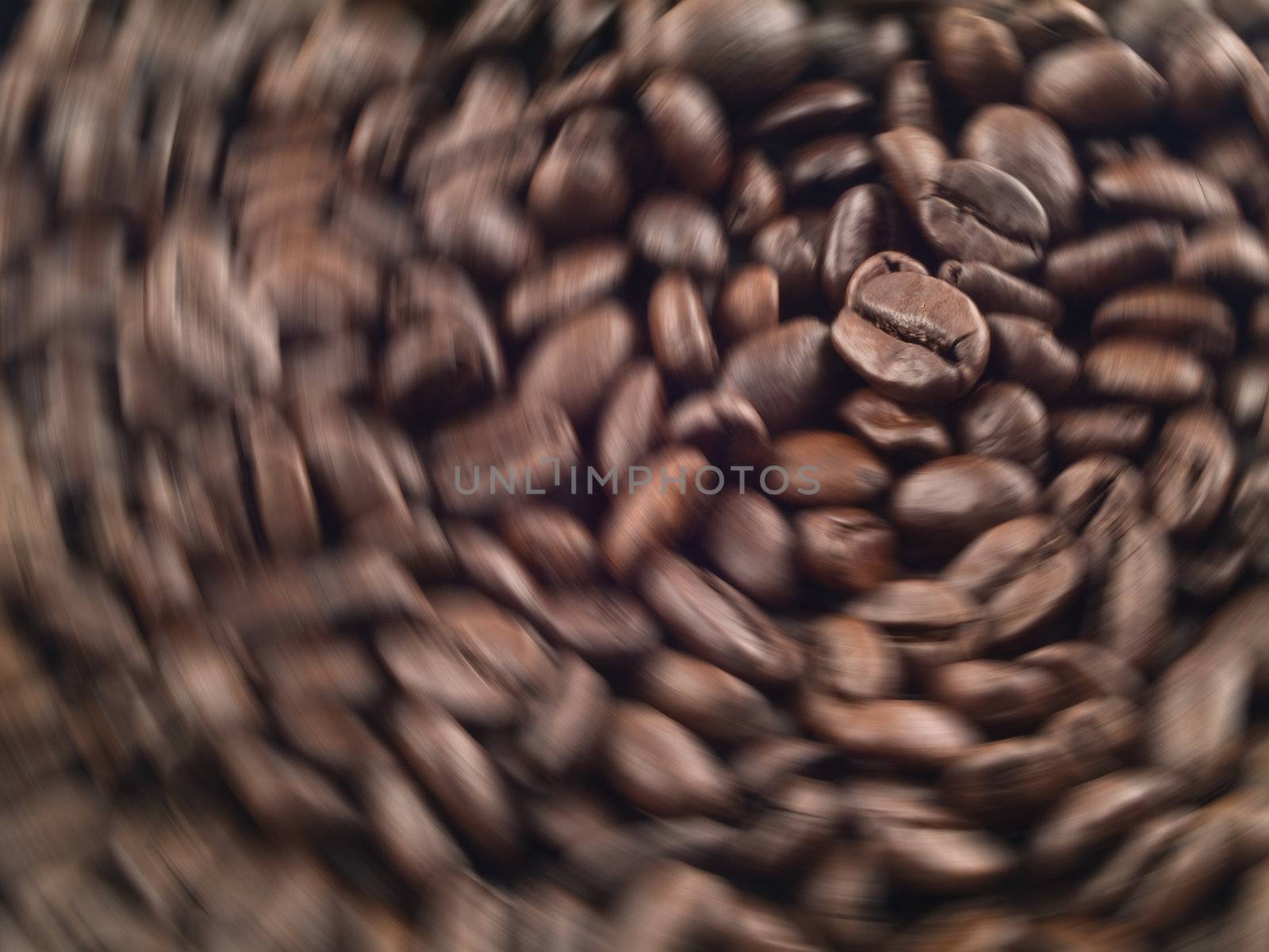 Coffee Bean Background spinning as in a grinder