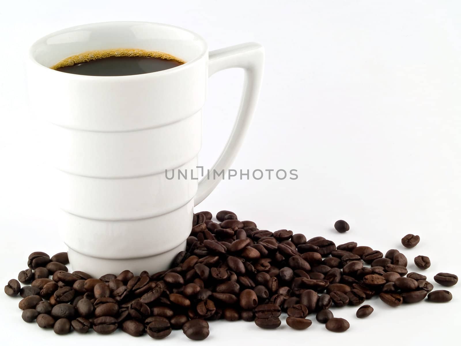 Coffee Cup and Beans on a White Background