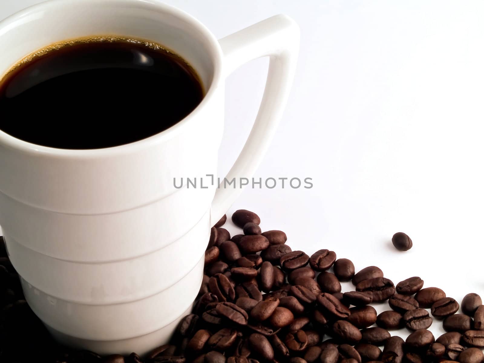 Coffee Cup and Beans on a White Background by Frankljunior