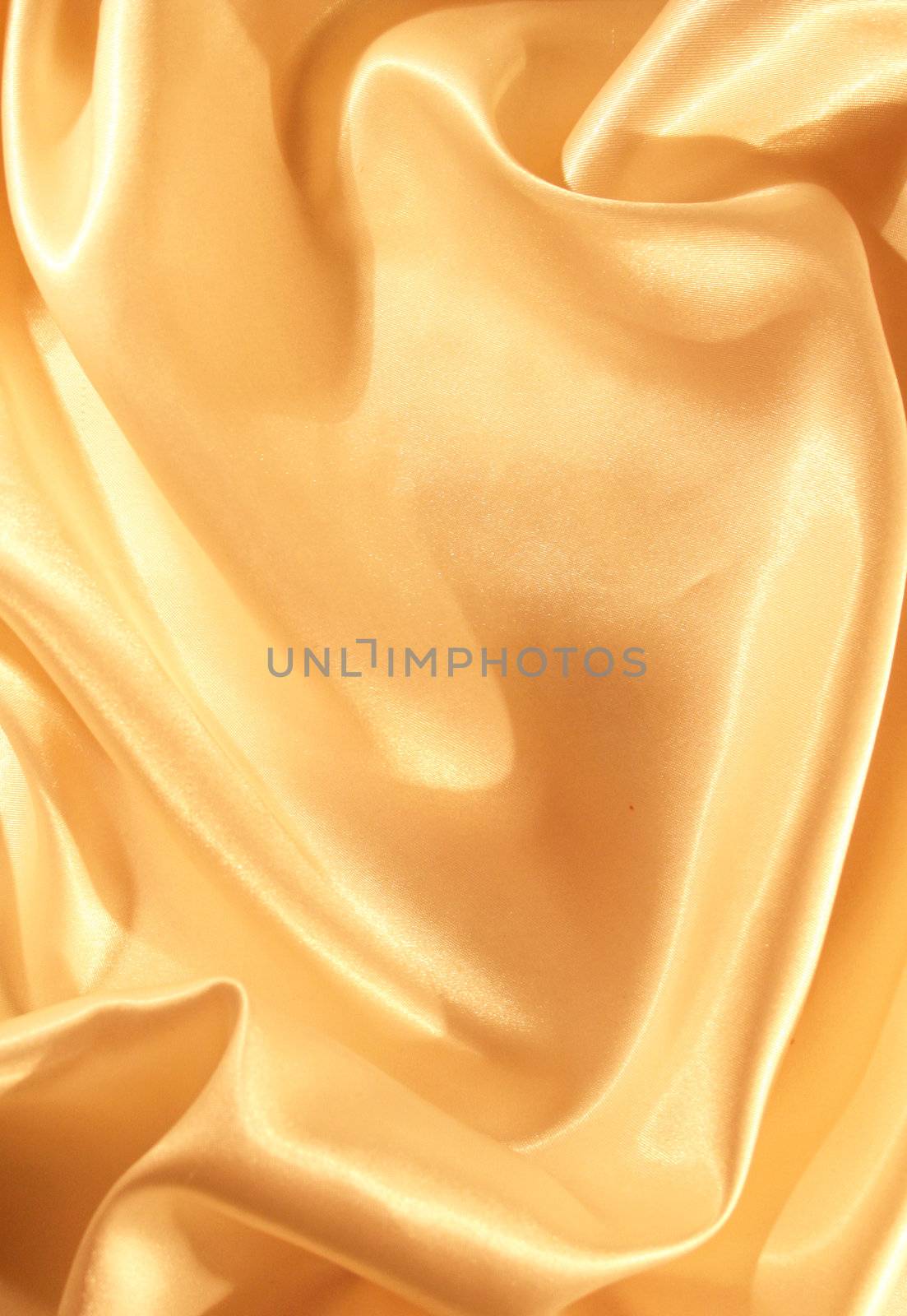 Smooth elegant golden silk can use as background

