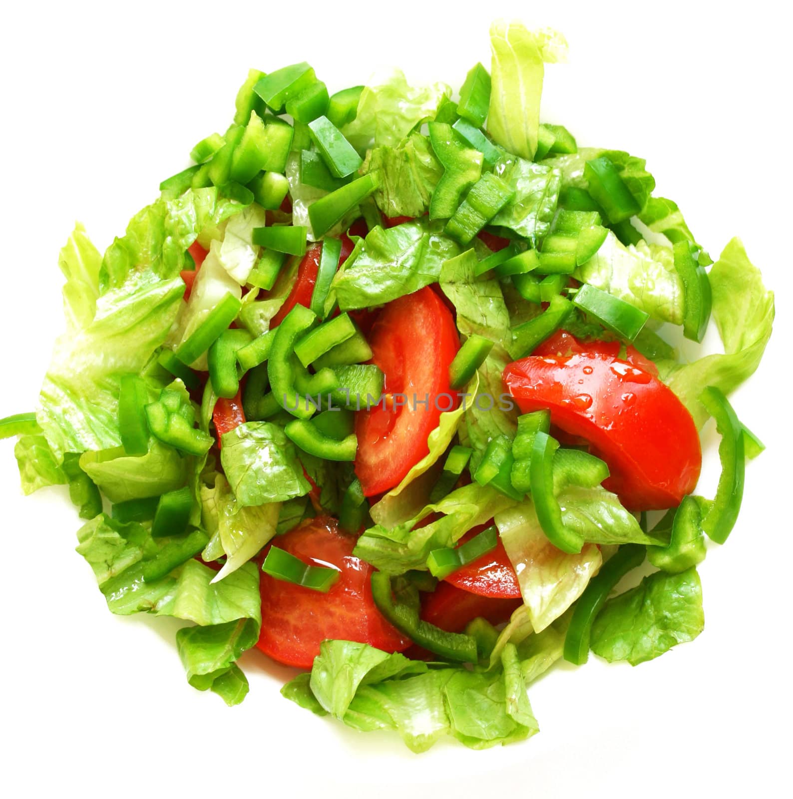 Healthy vegetarian Salad on the white plate over white 