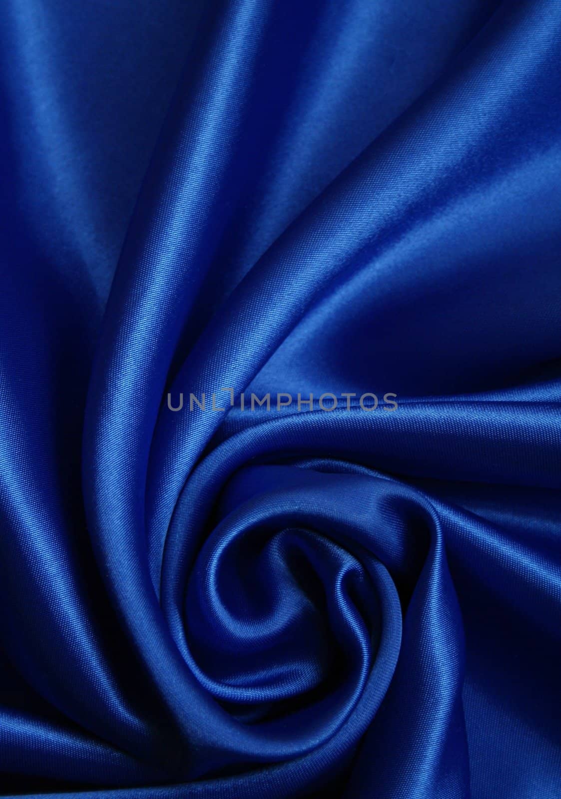 Smooth elegant dark blue silk can use as background 


