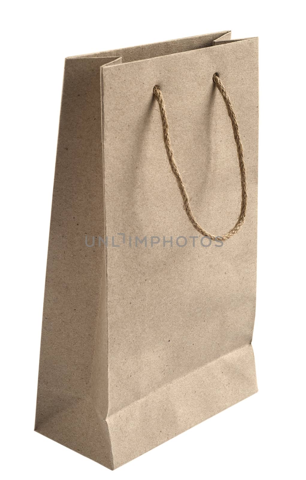 Recycled paper bag with hemp rope handles isolated on white background