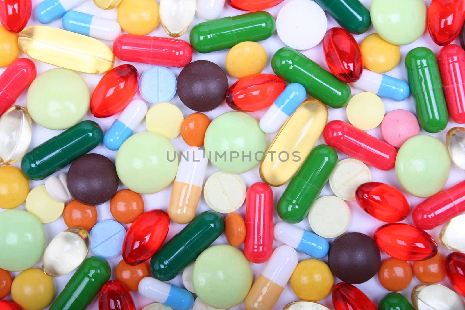 Various multicolor pills and capsules as pharmaceutical background