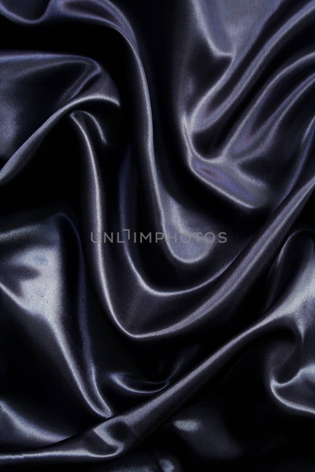 Smooth elegant black silk can use as background 