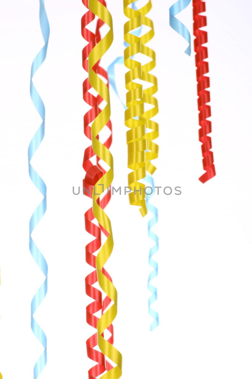 Celebratory streamer of red green and yellow color on a white background (look similar images in my portfolio)