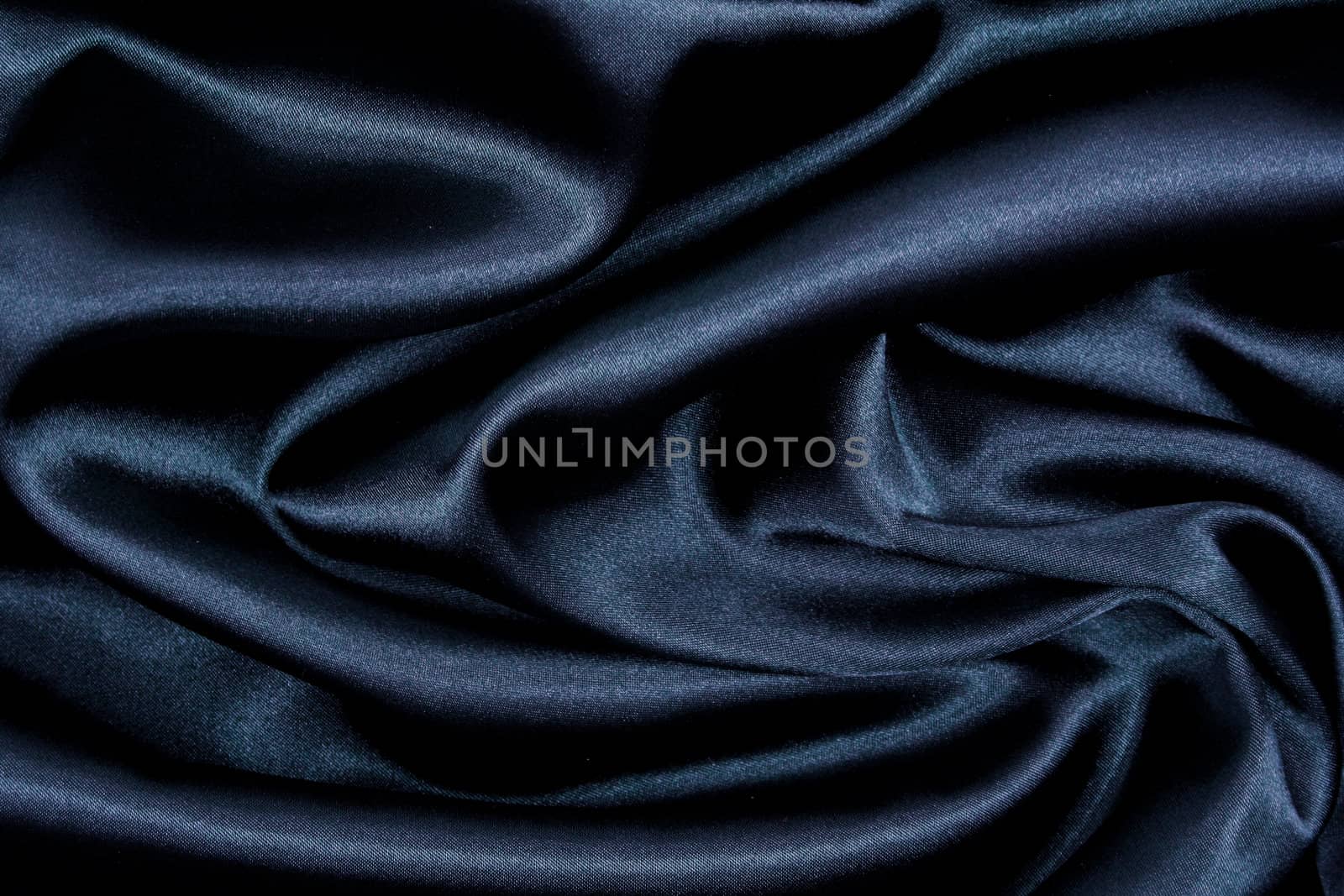 Smooth elegant black silk can use as background 