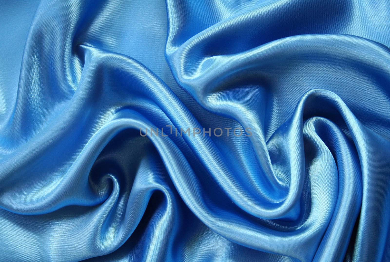 Smooth elegant dark blue silk can use as background 