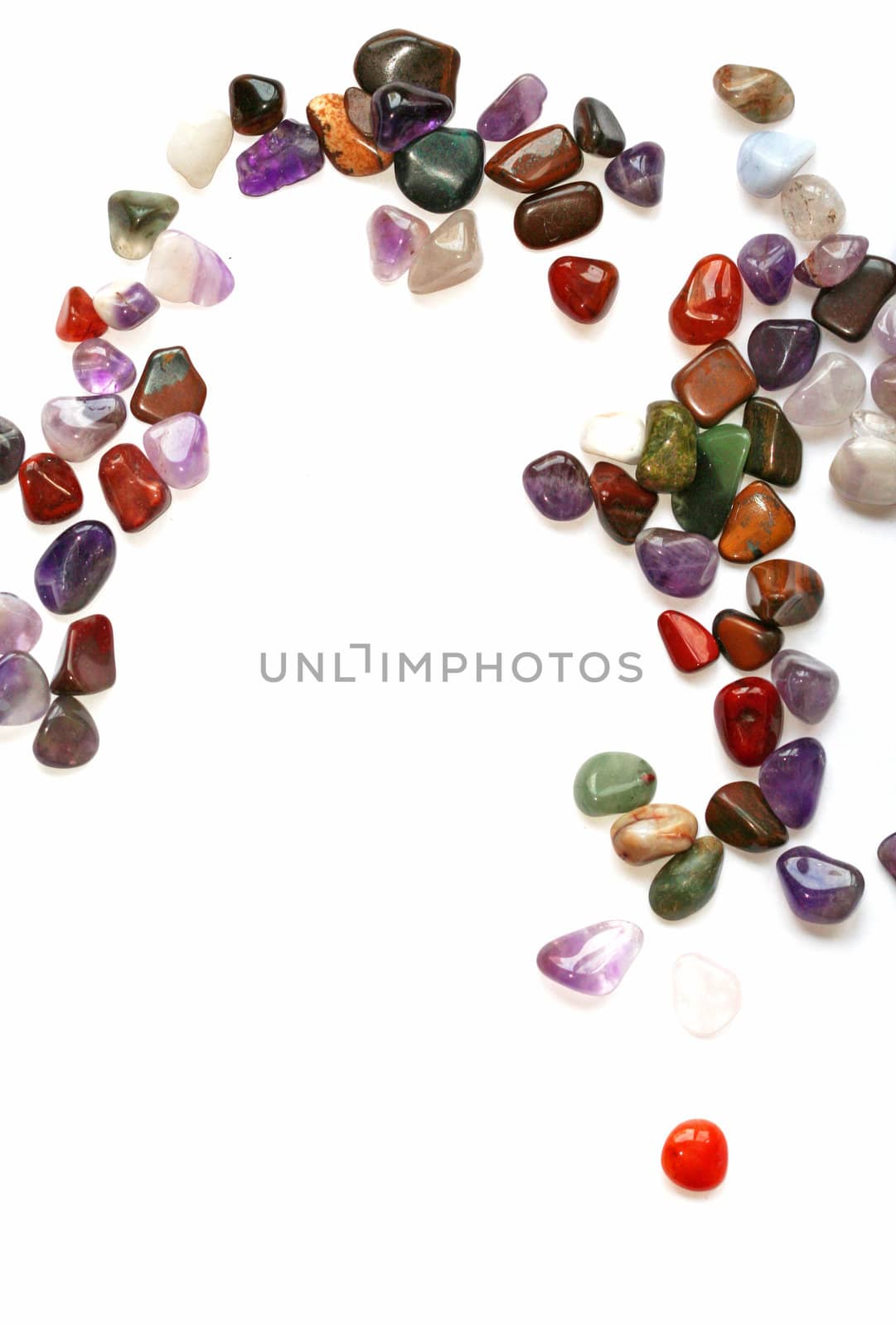 Colorful semiprecious stones on white background