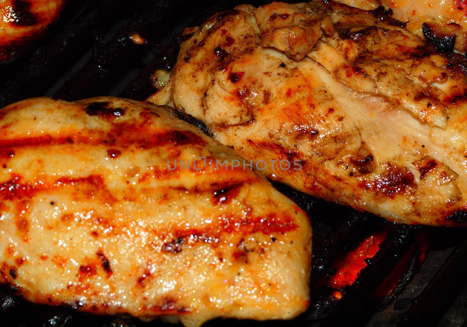 Fresh Grilled Chicken Breasts on the Barbecue by Frankljunior